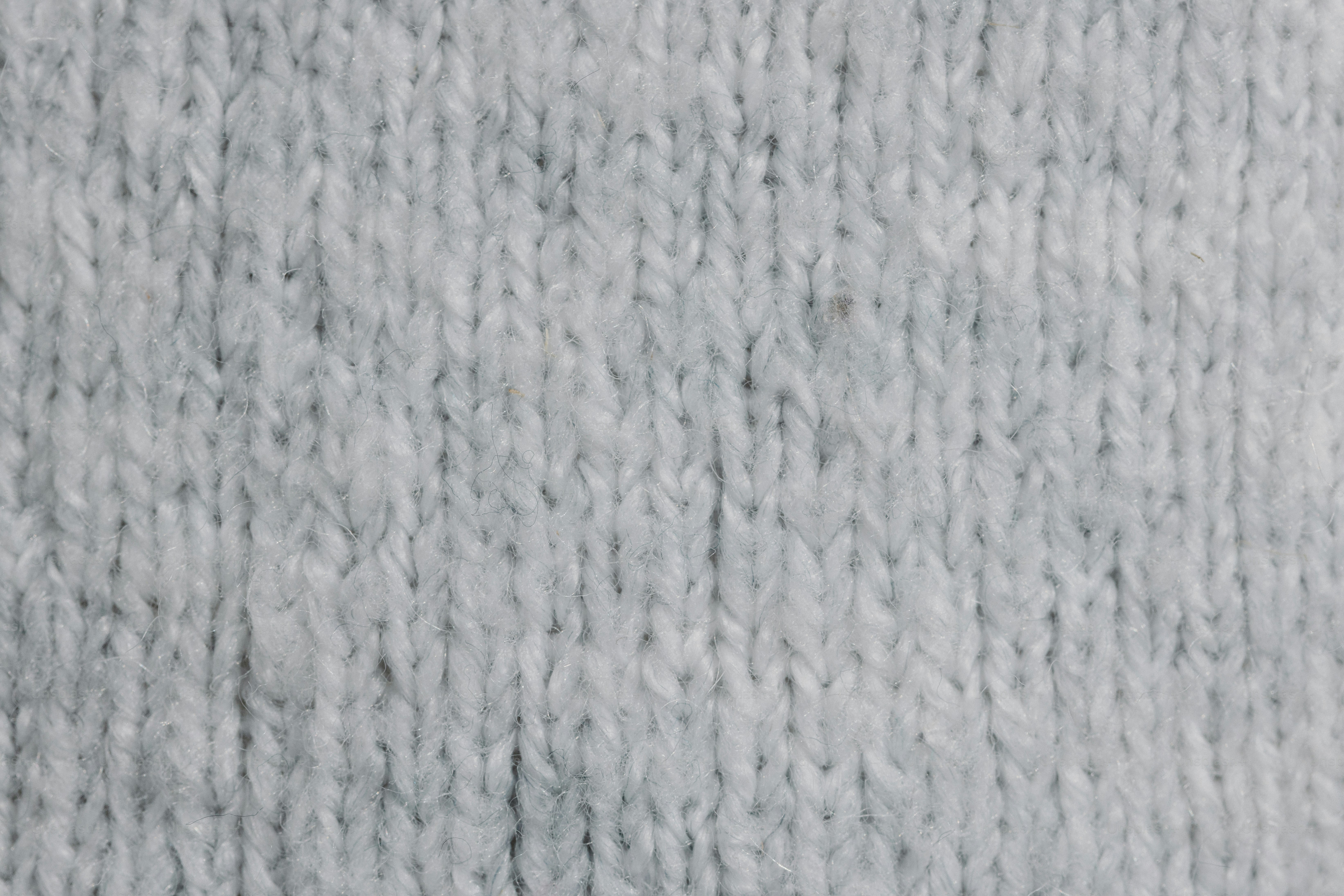 Close-up of light gray knitted fabric texture photo – Texture Image on ...