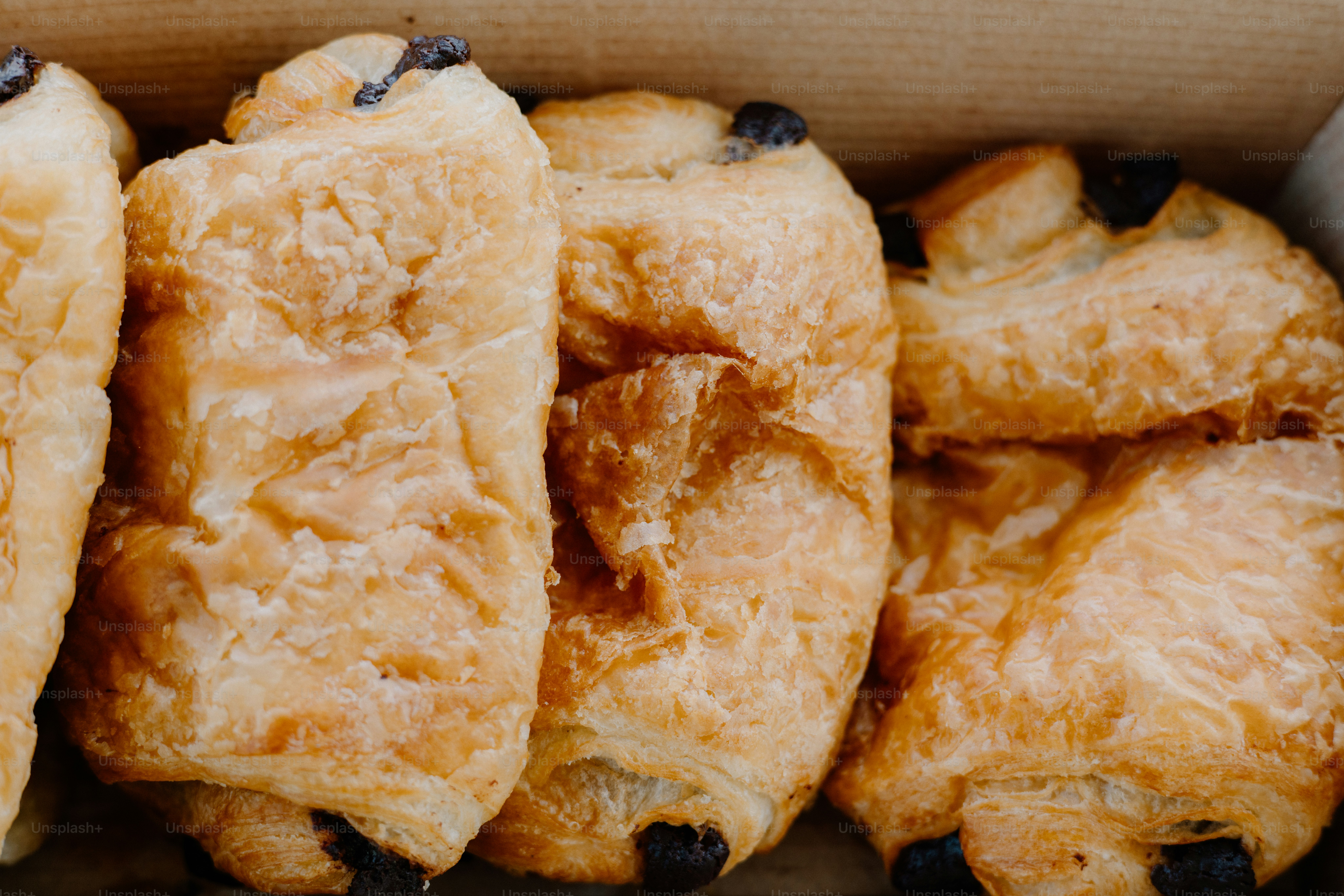 Golden brown pastries with dark chocolate filling