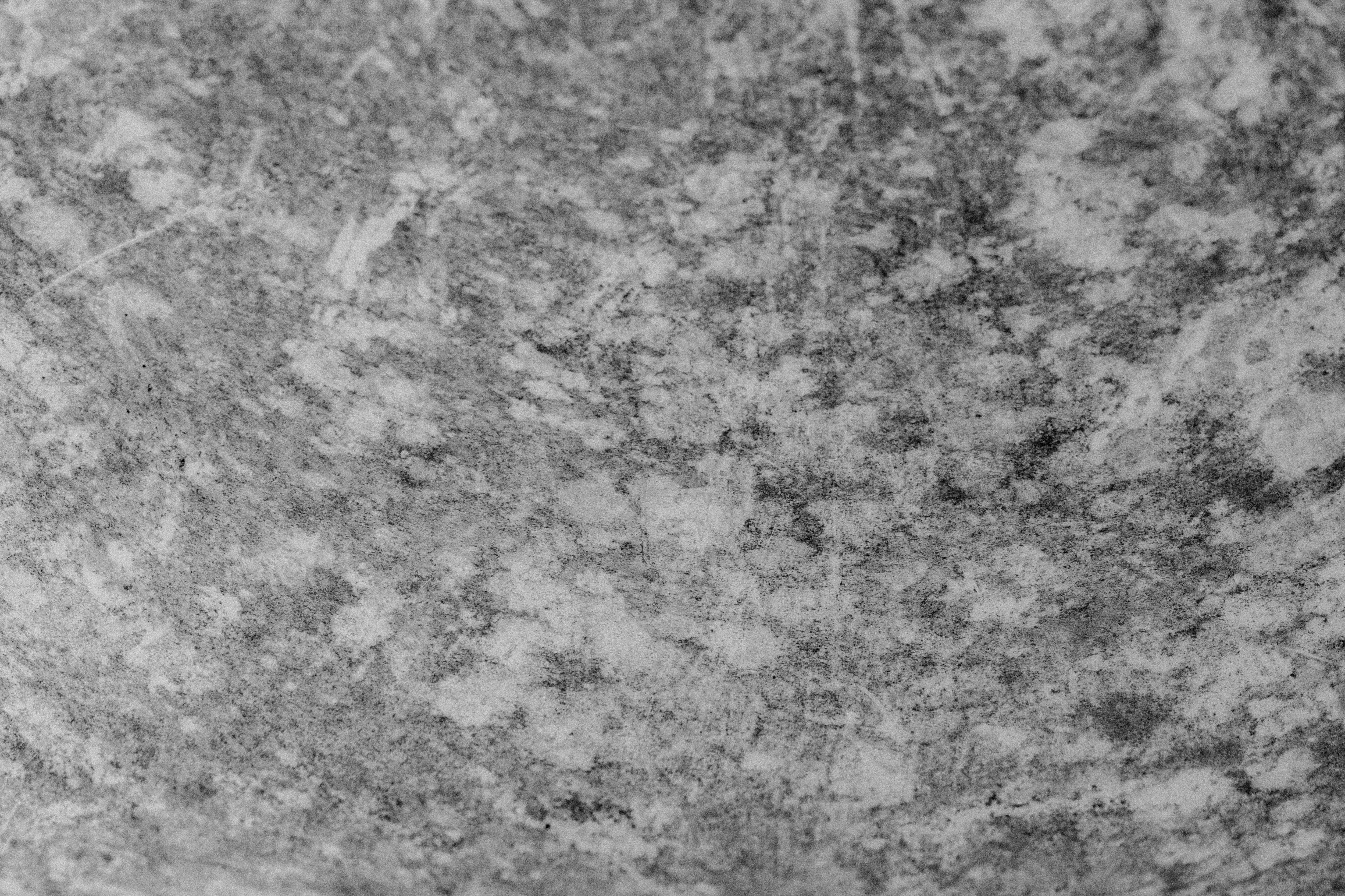 Close-up of a textured gray surface with white patterns photo ...