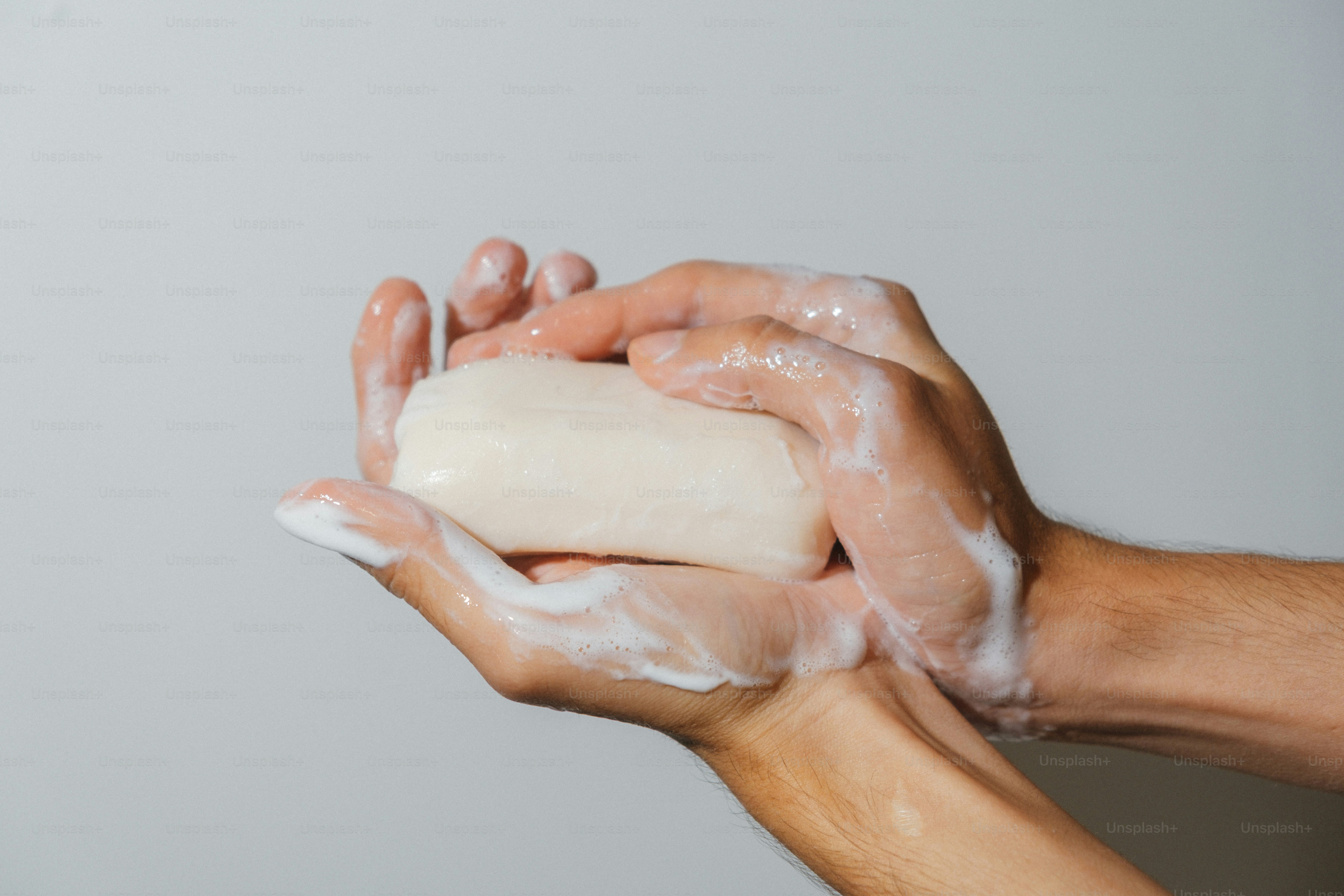 Hands washing with soap and foam
