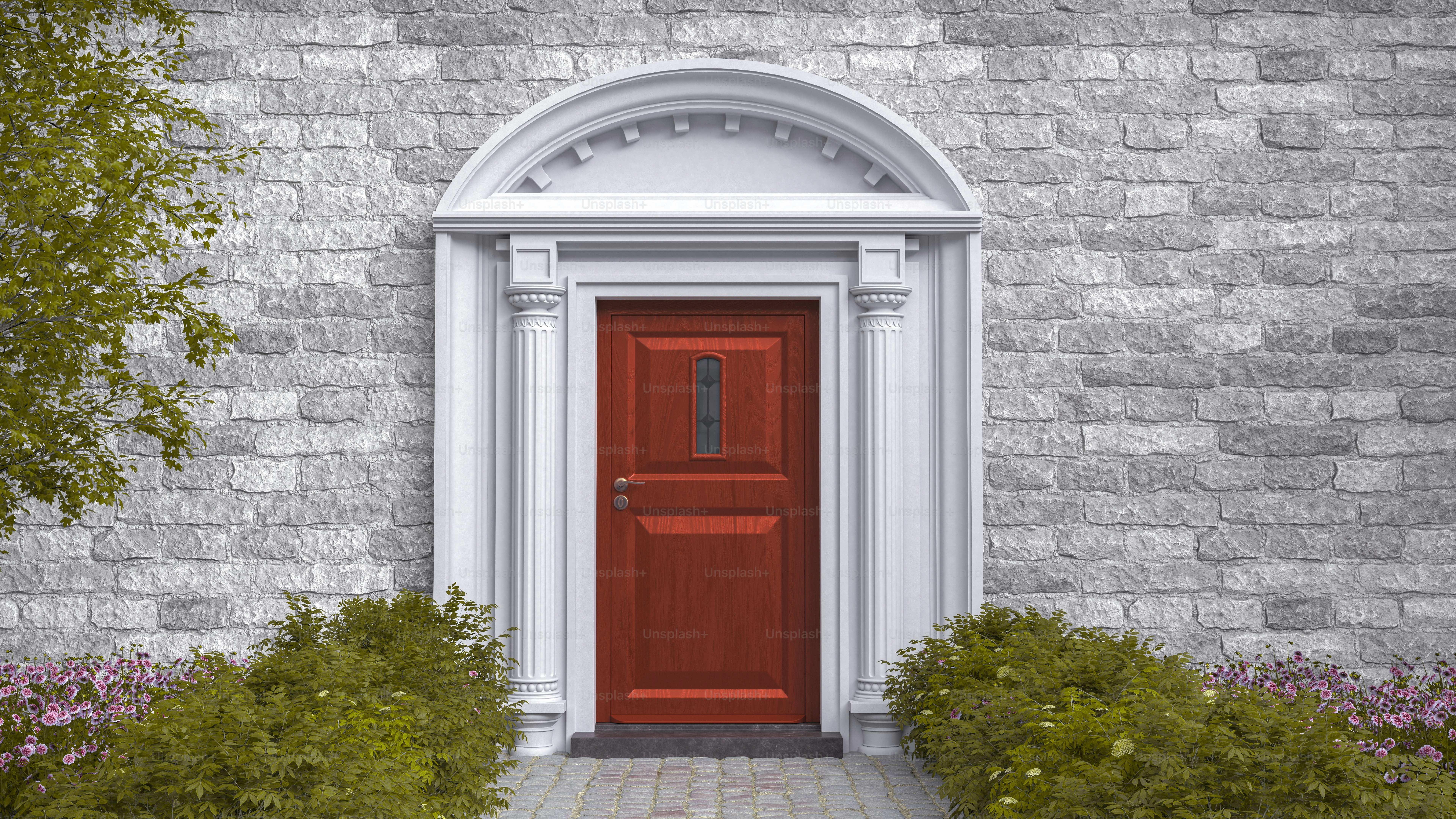 石垣に窓が設置された赤い扉。