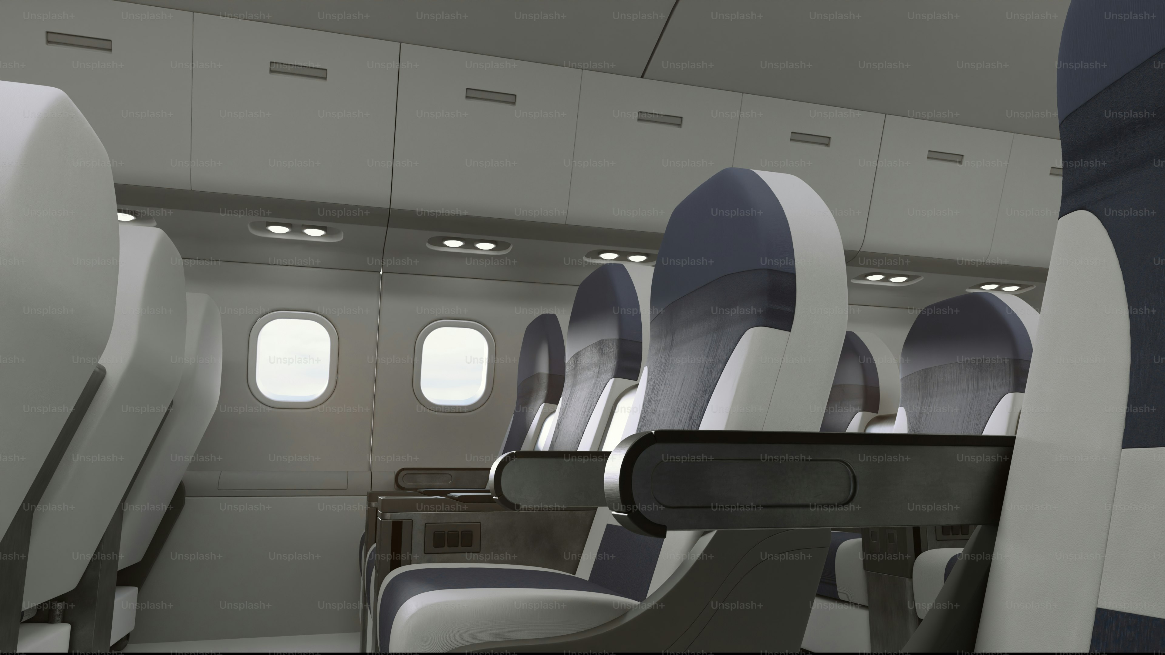 Cabine de avião vazia com fileiras de assentos.