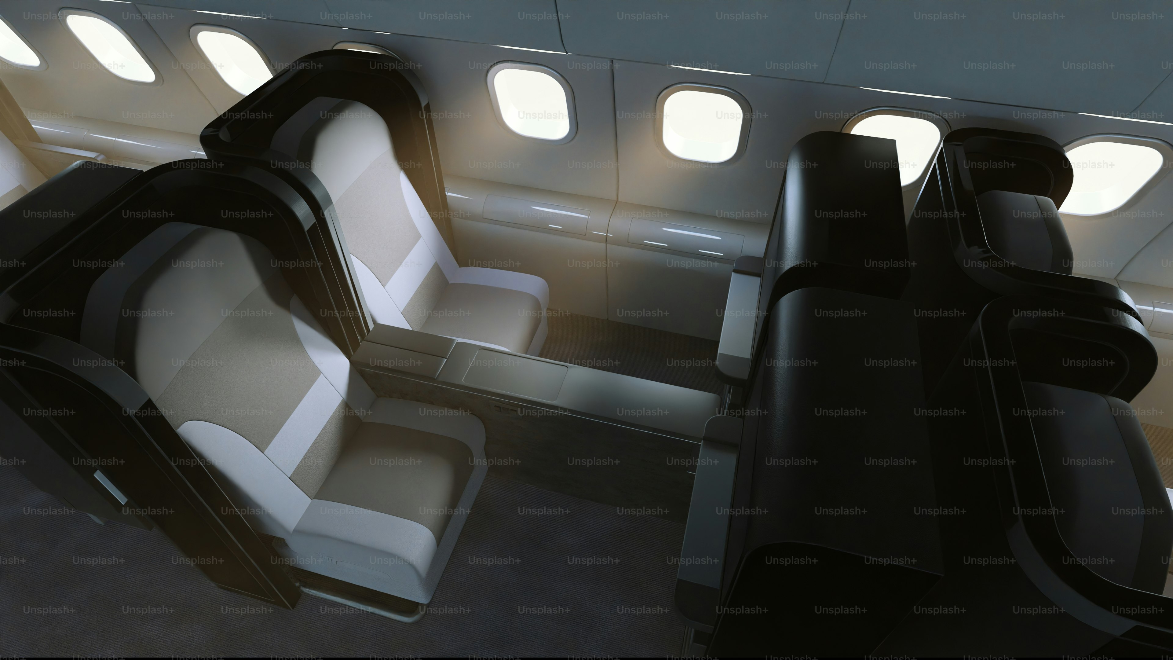 Luxurious airplane cabin with comfortable seating arrangement.
