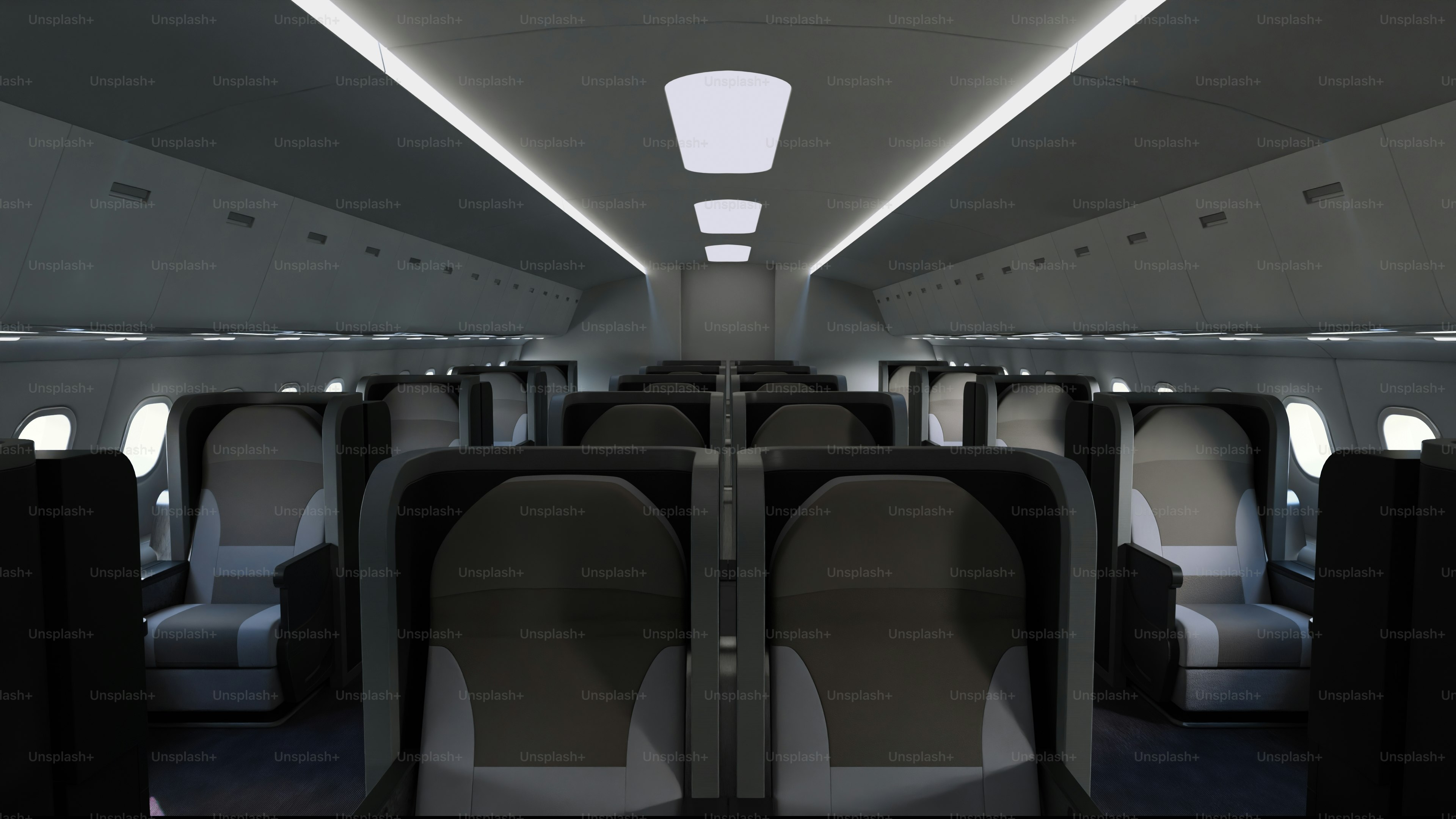 Modern train interior with empty seats and overhead lighting