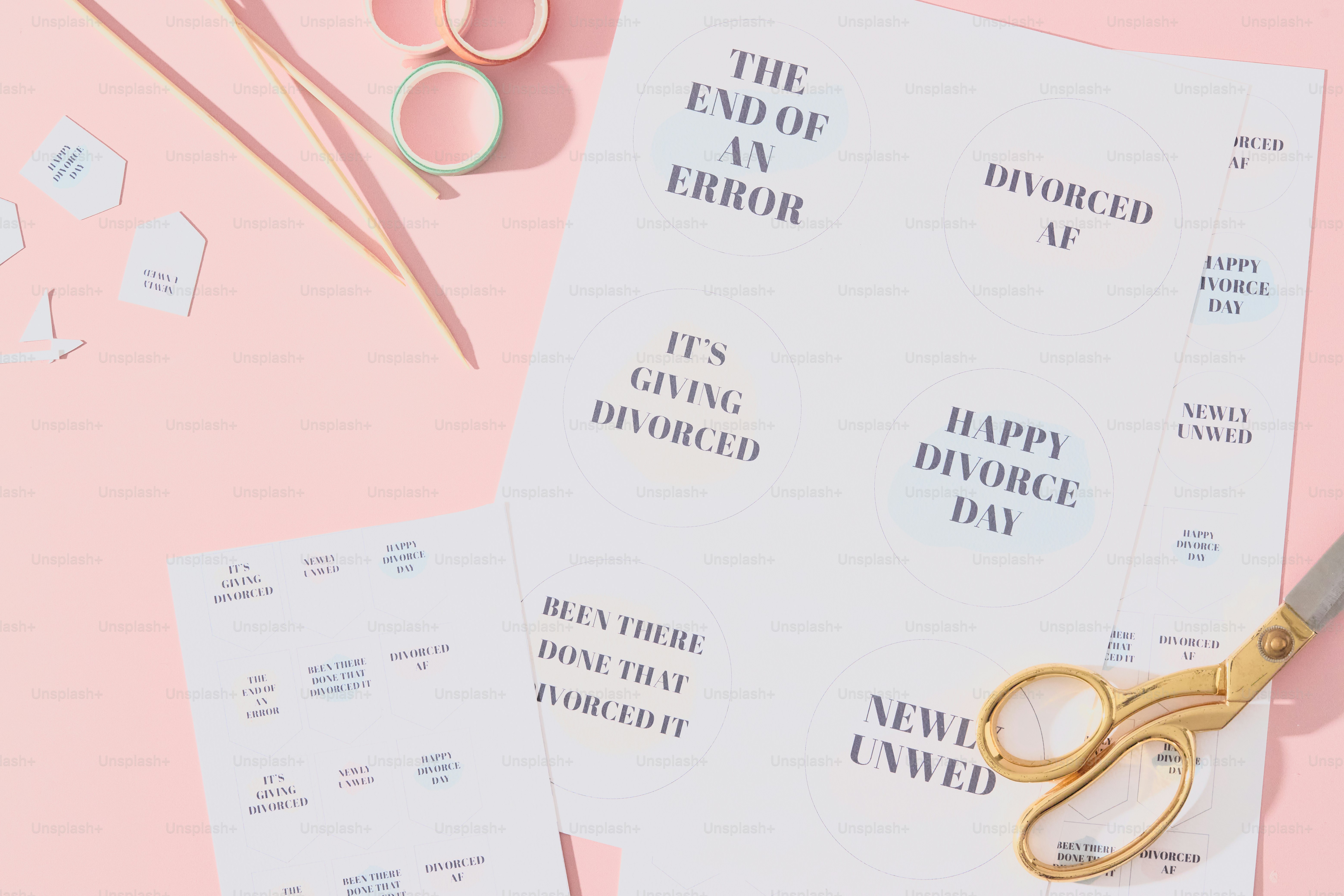 Paper with divorce-themed phrases and other phrases.
