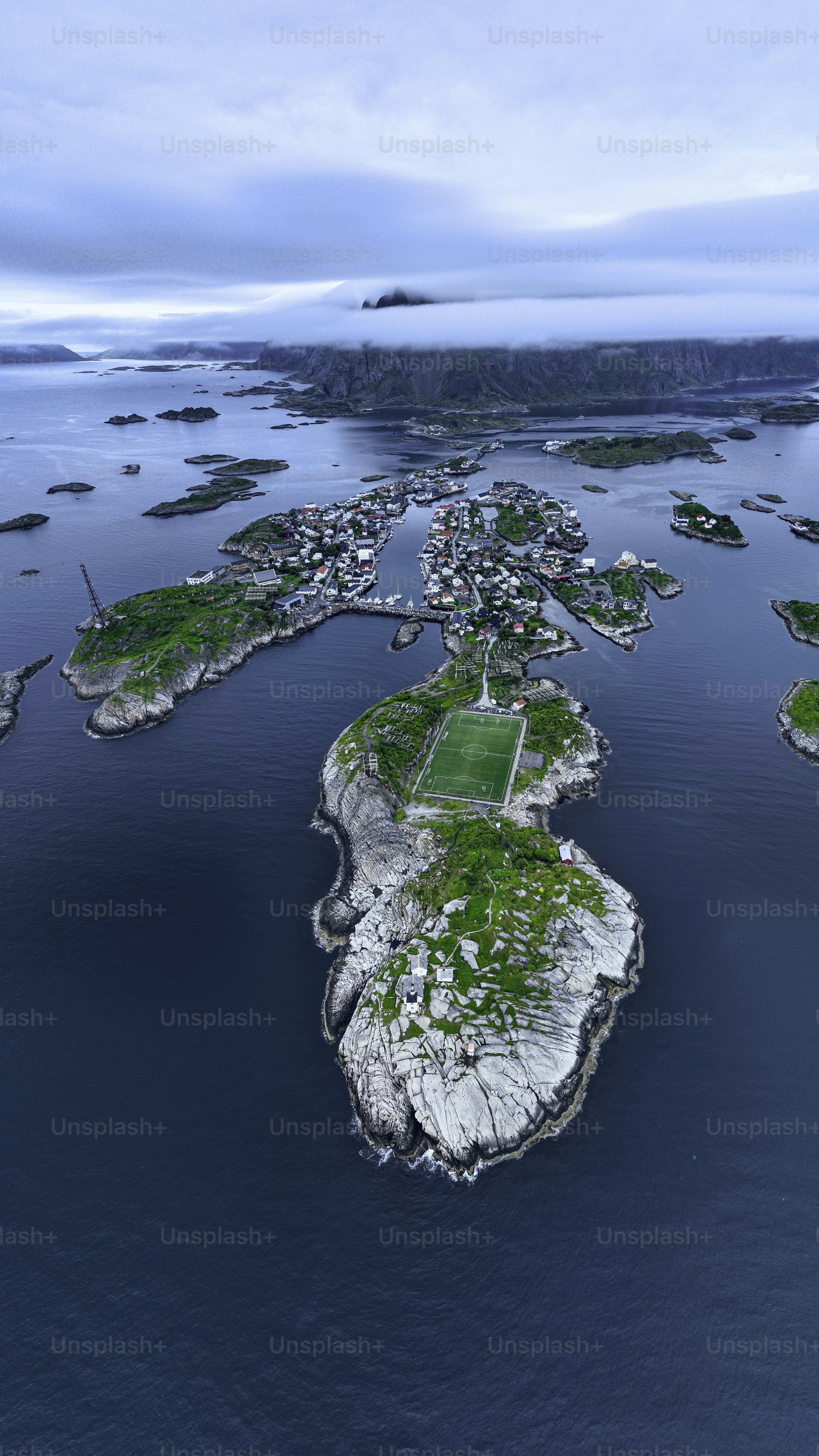Island village with a soccer field by the sea