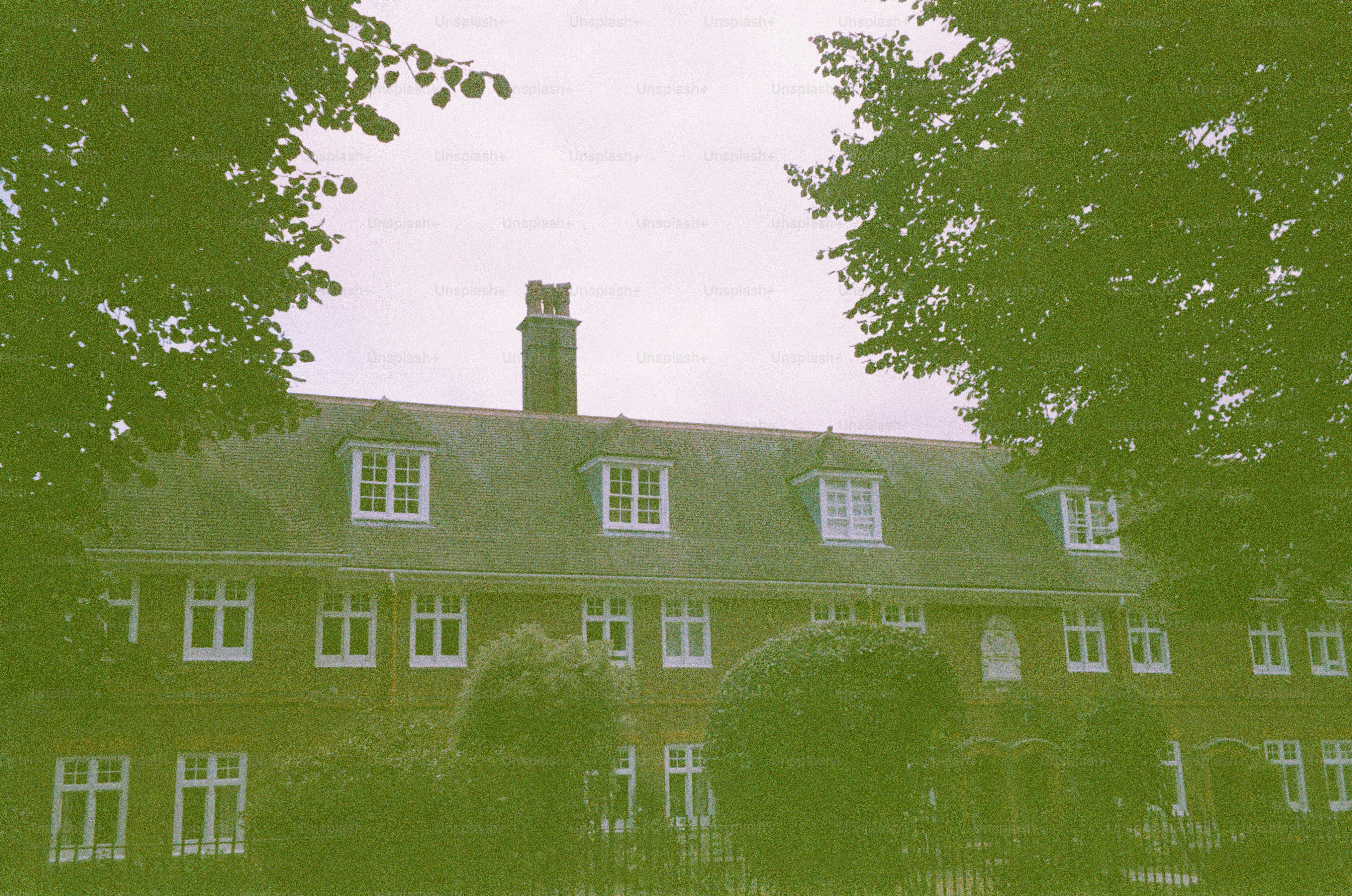 Building with dormer windows and chimney