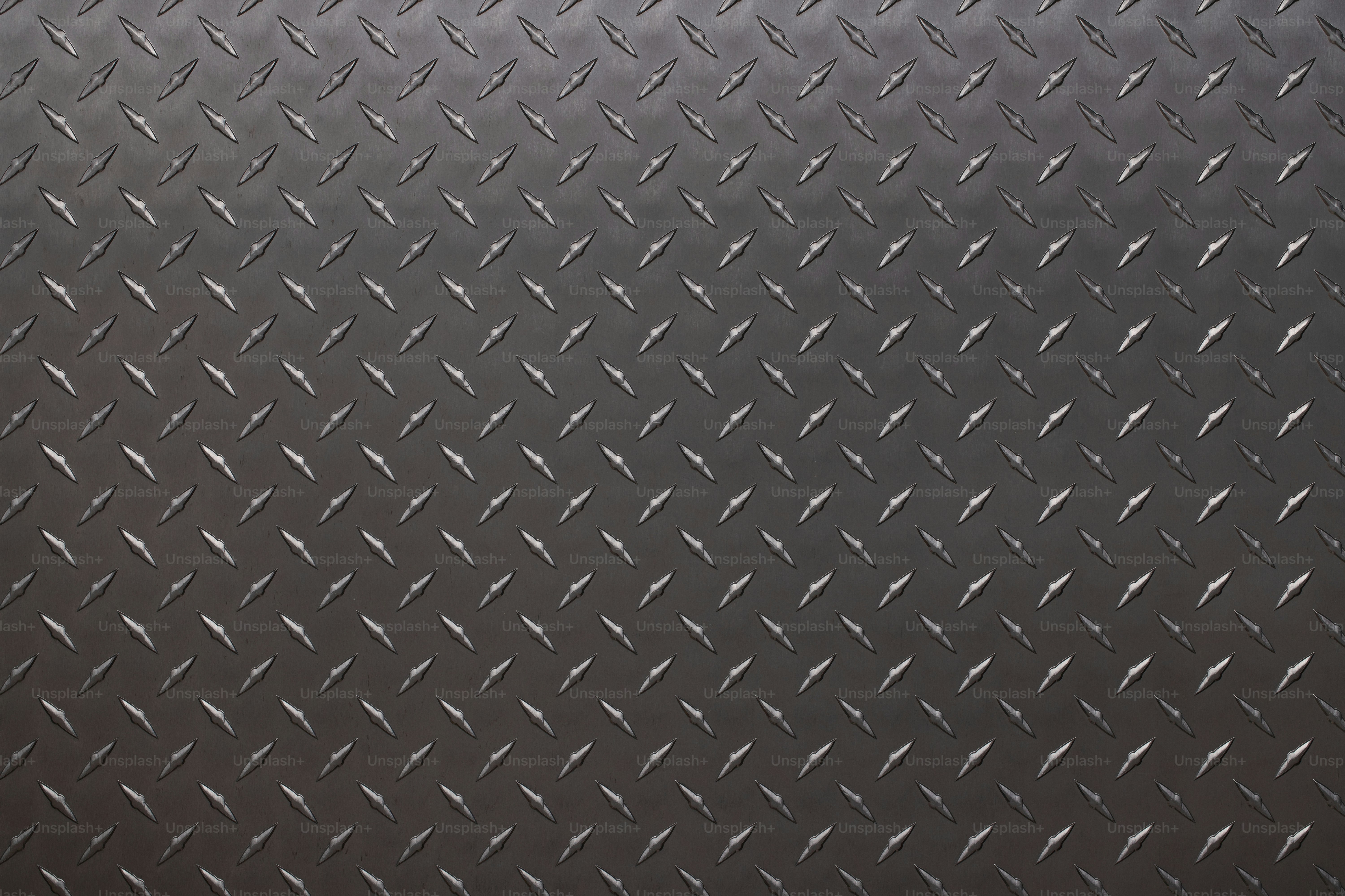다이아몬드 패턴, 강철 배경이 있는 어두운 금속 질감