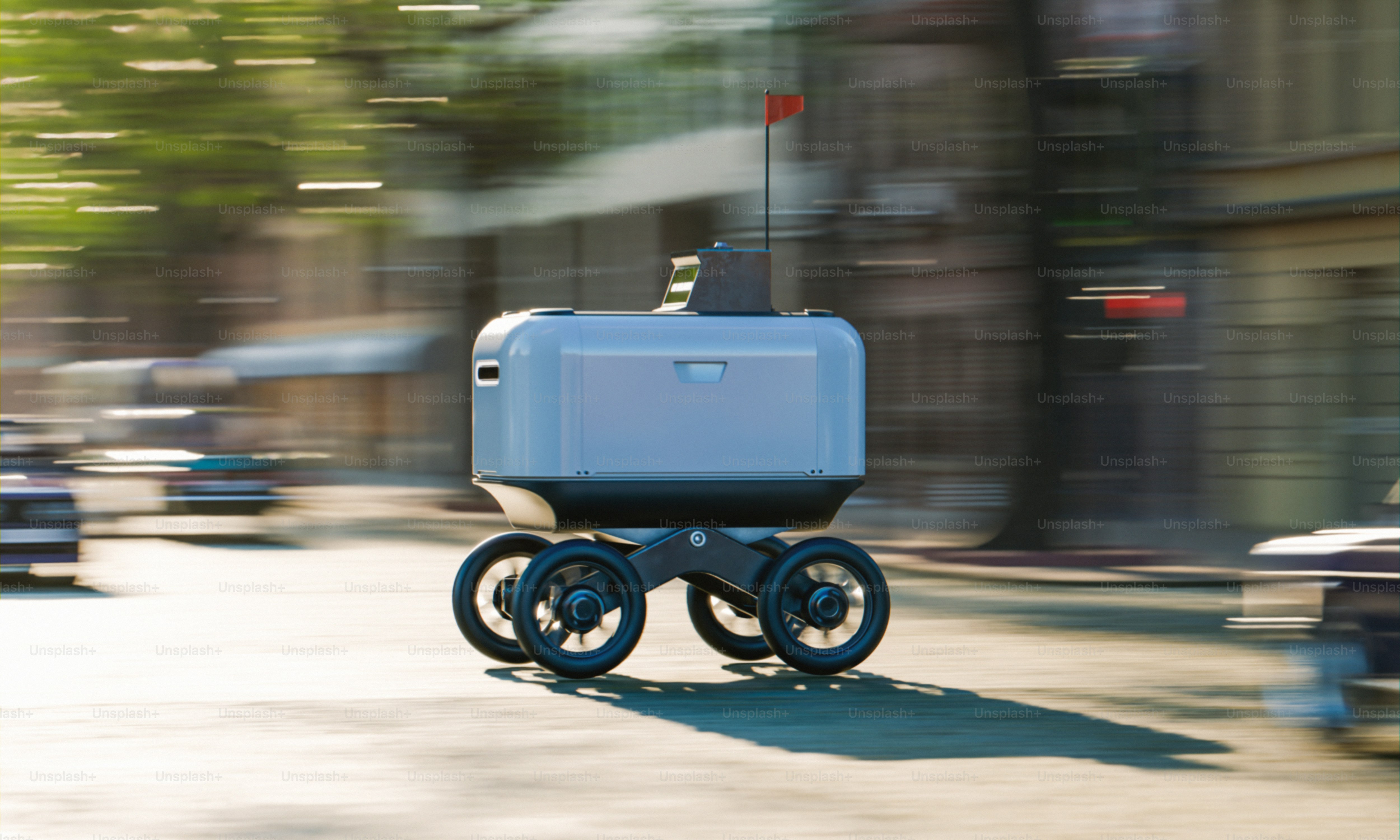 ぼやけた街路を配達ロボットが走行する