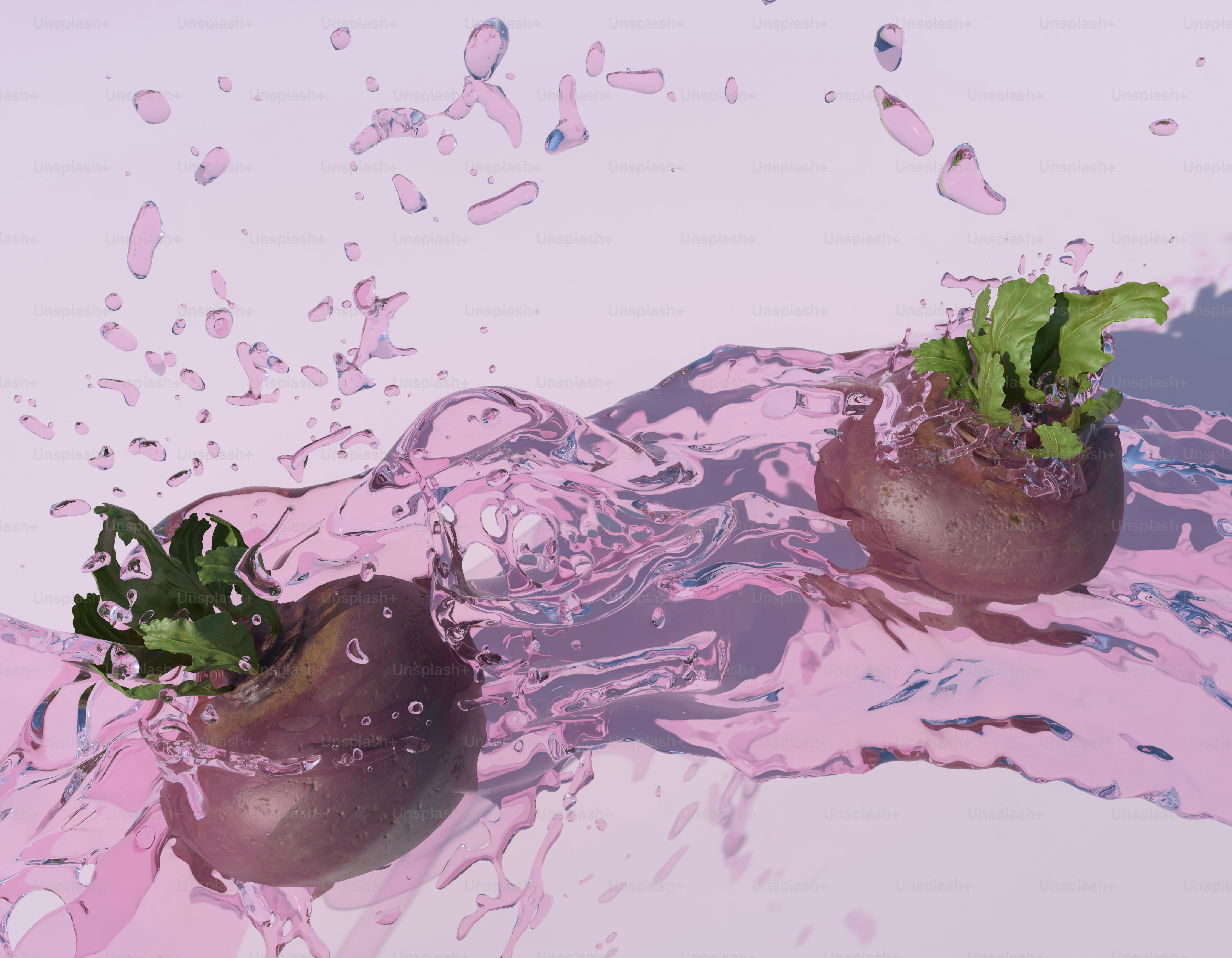 Two beets splashing in pink liquid