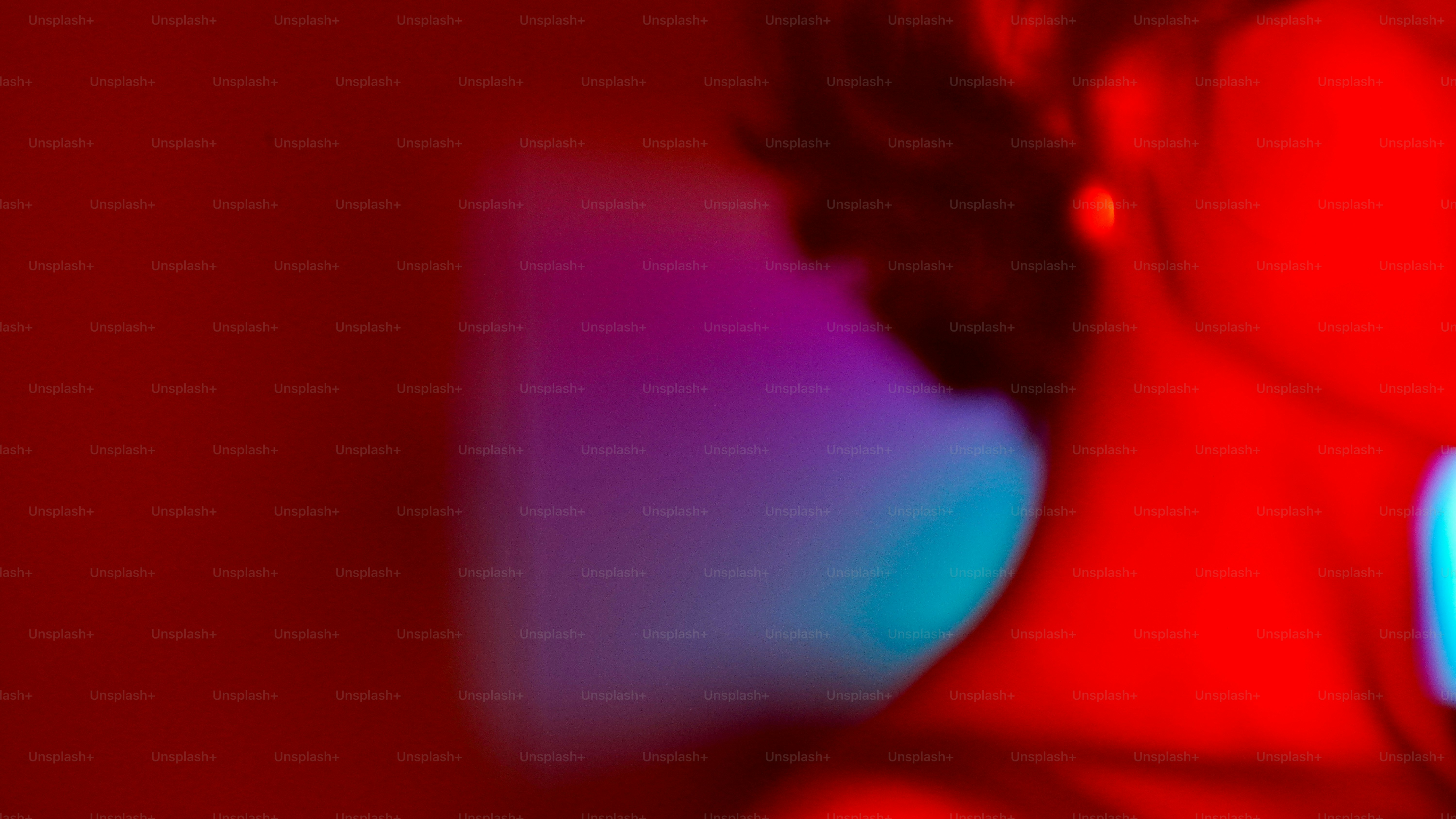 Woman's profile in red and blue light