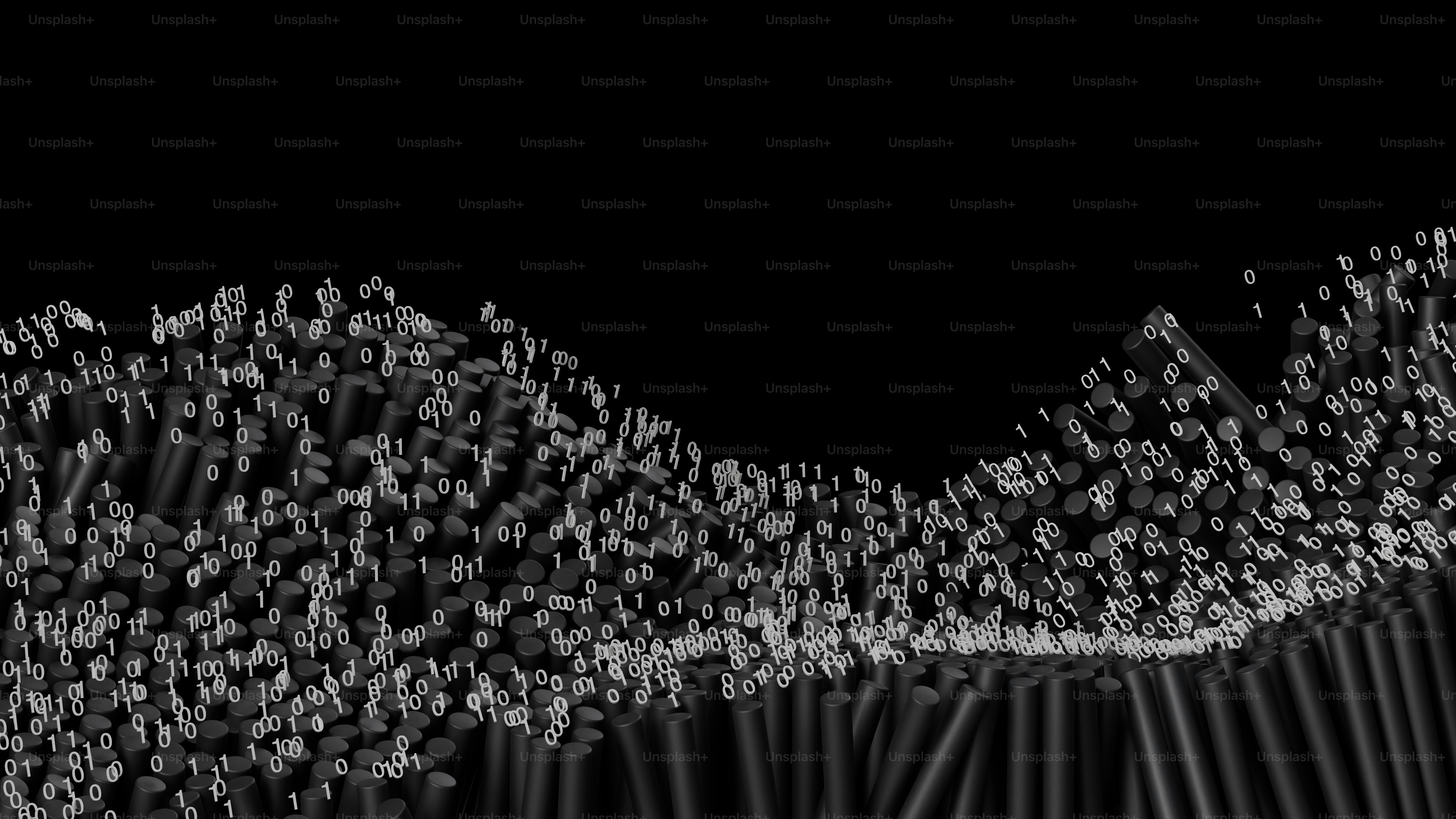 Abstract wave of small gray particles against black background