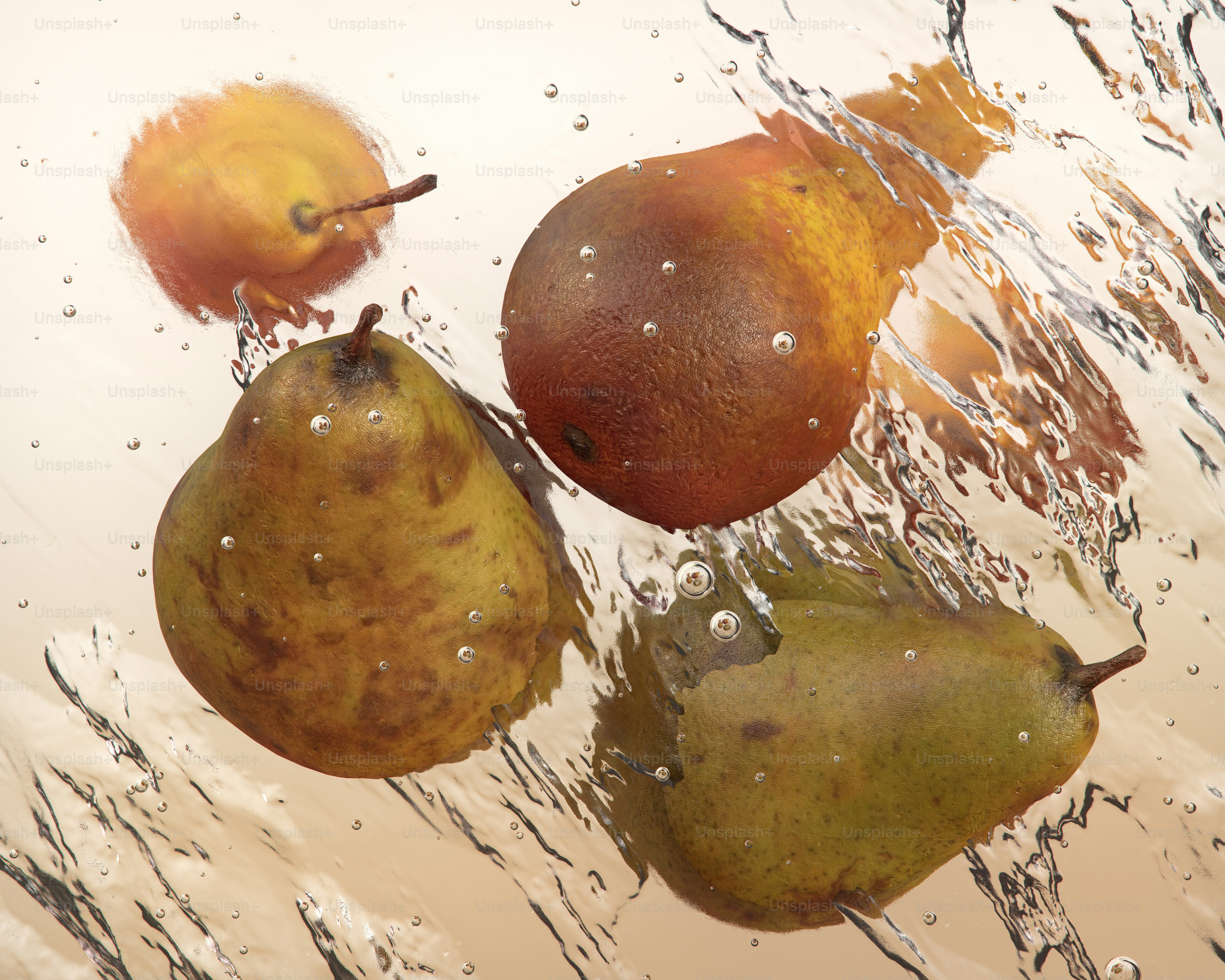 Four pears splashing into clear water