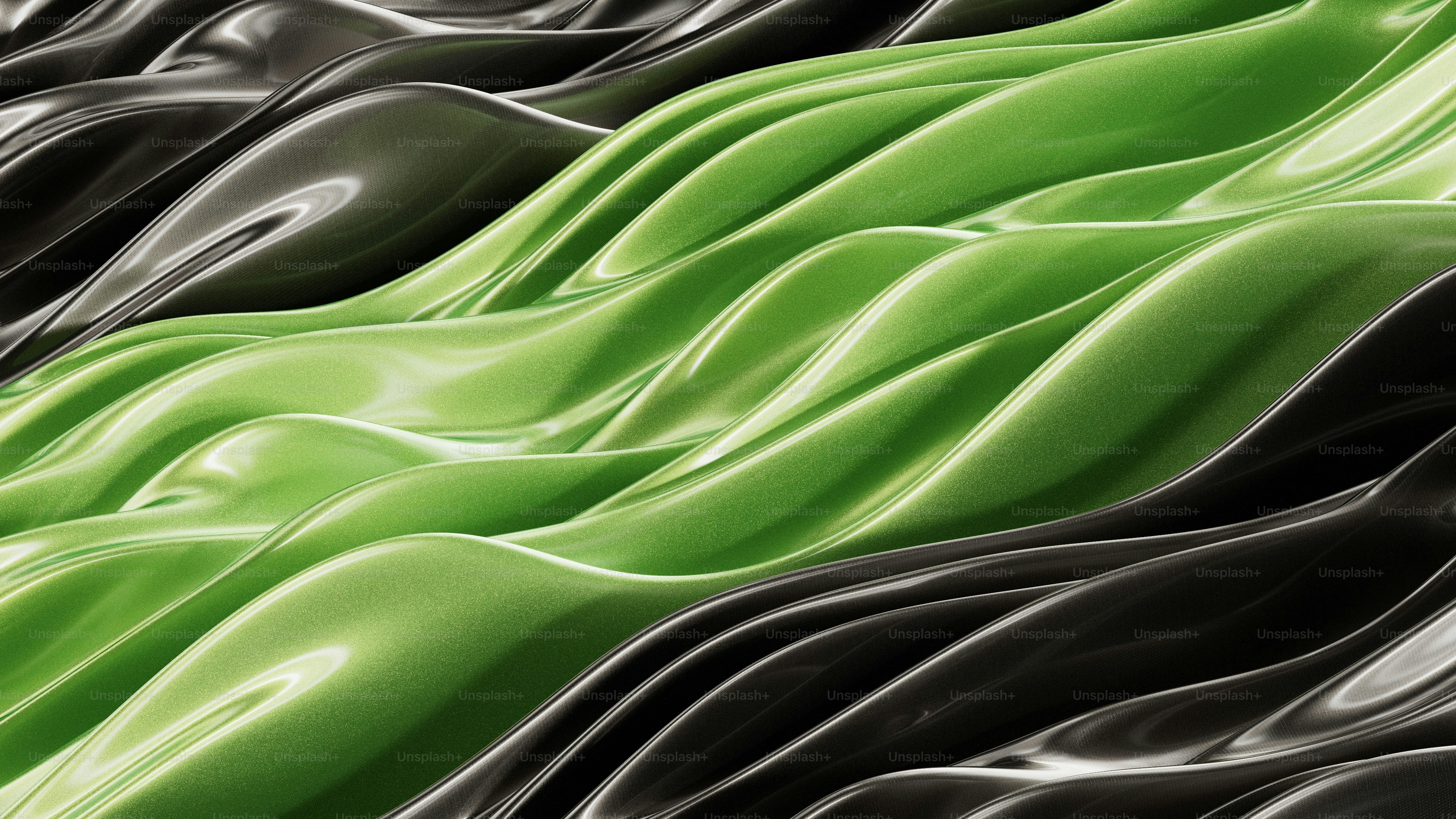 Abstract flowing waves of green and black material.