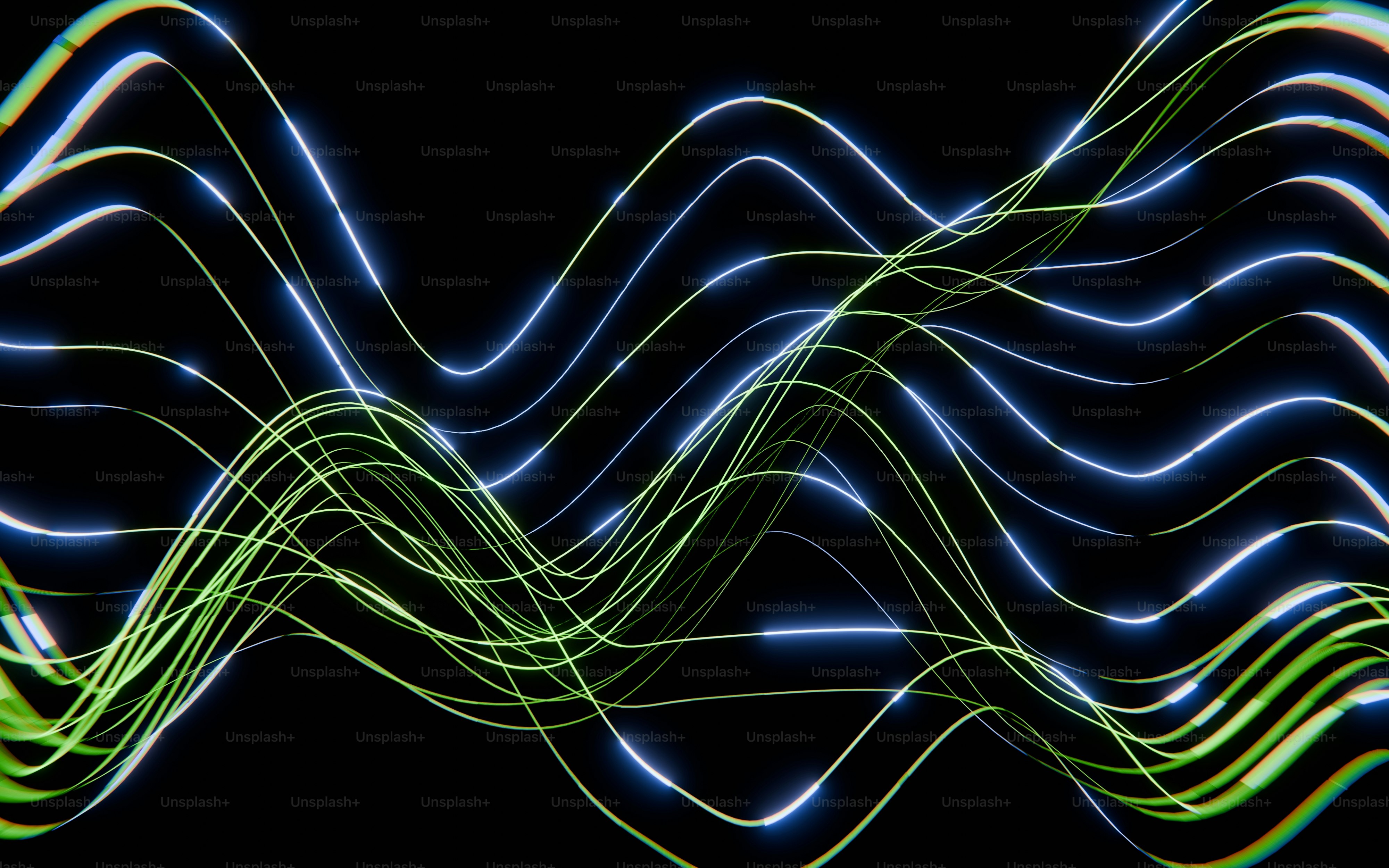 Abstract wavy lines of blue and green light