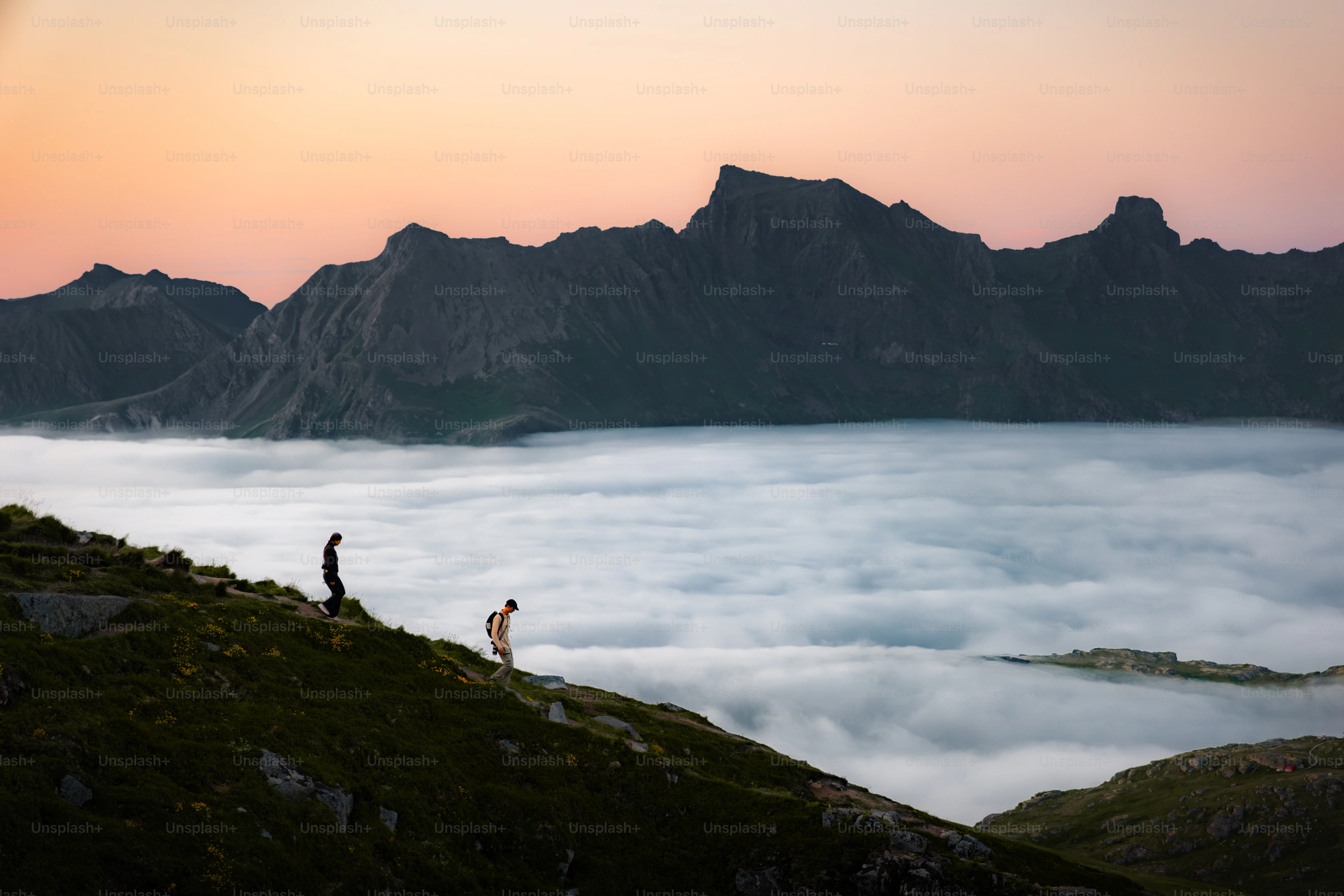 Rising above the clouds. Movement, mobility, and the systemic resilience of the peaceful warrior. Photo by Daniel J. Schwarz on Unsplash.