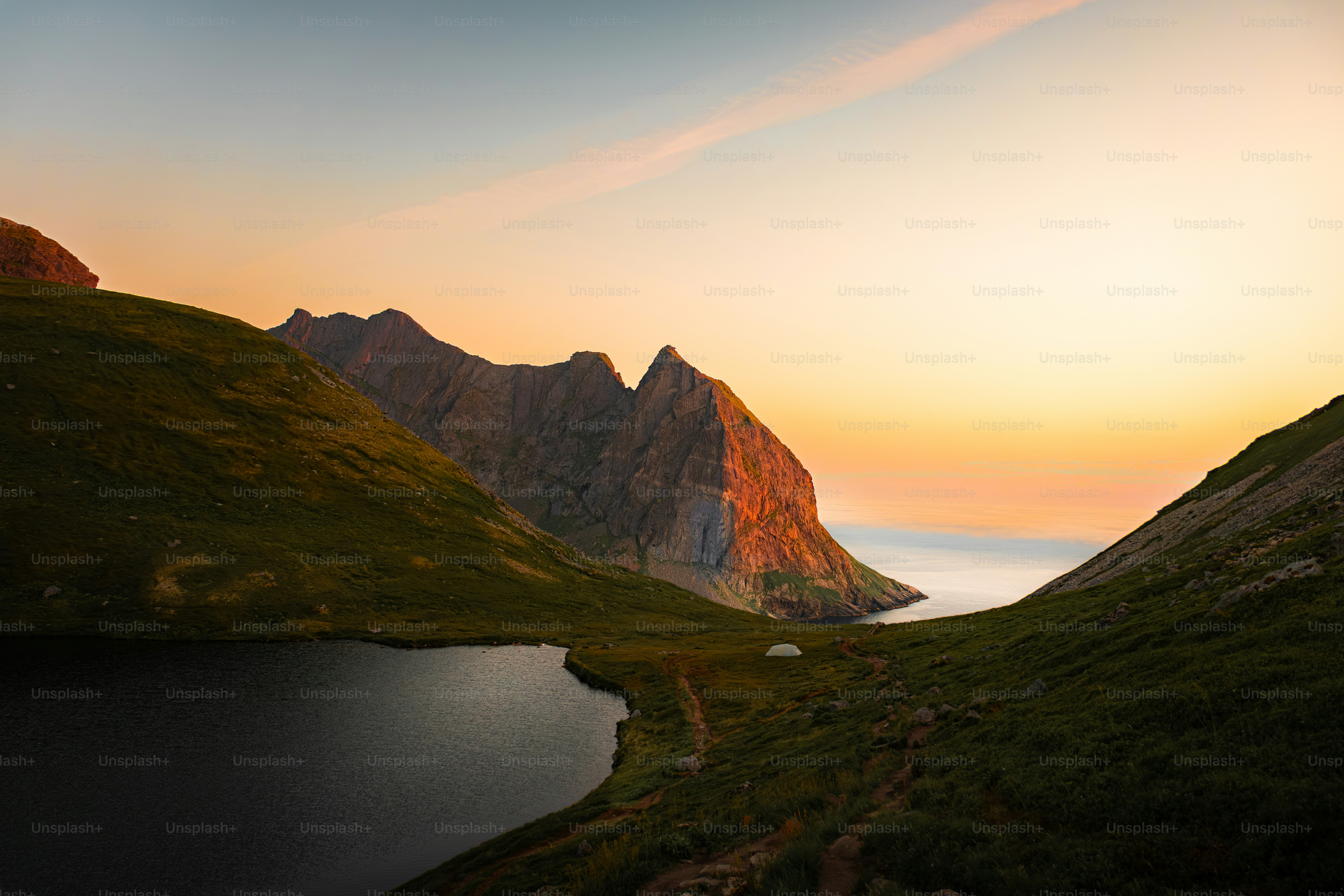 Mountain landscape with a lake at sunset photo – Travel Image on Unsplash