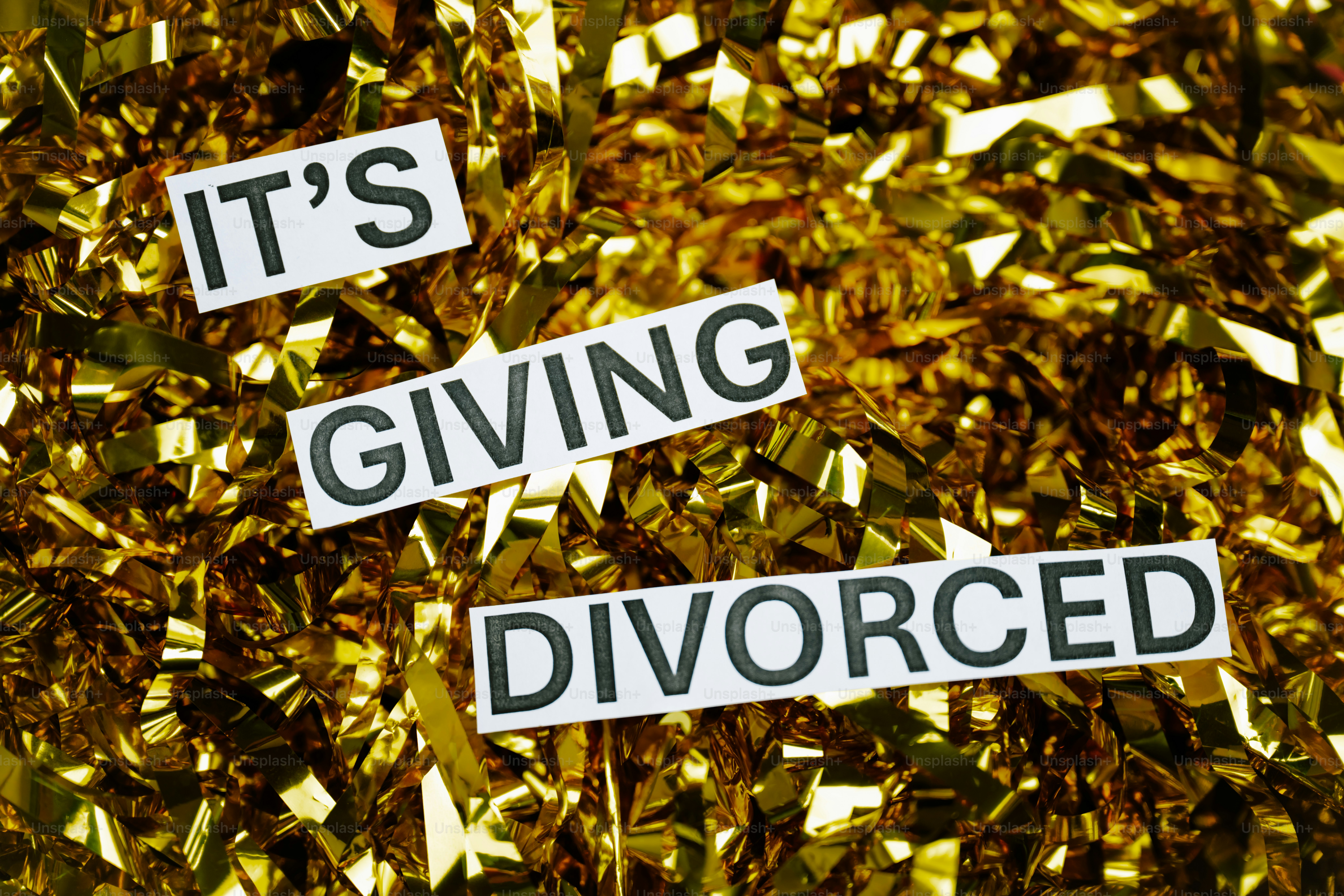 It's giving divorced text on gold confetti