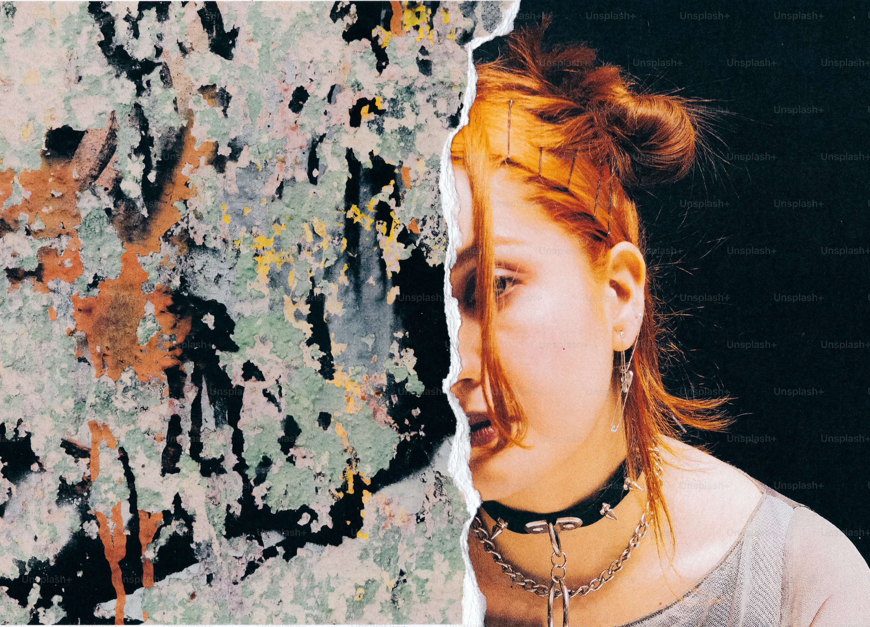 Woman with red hair peeking from behind abstract art