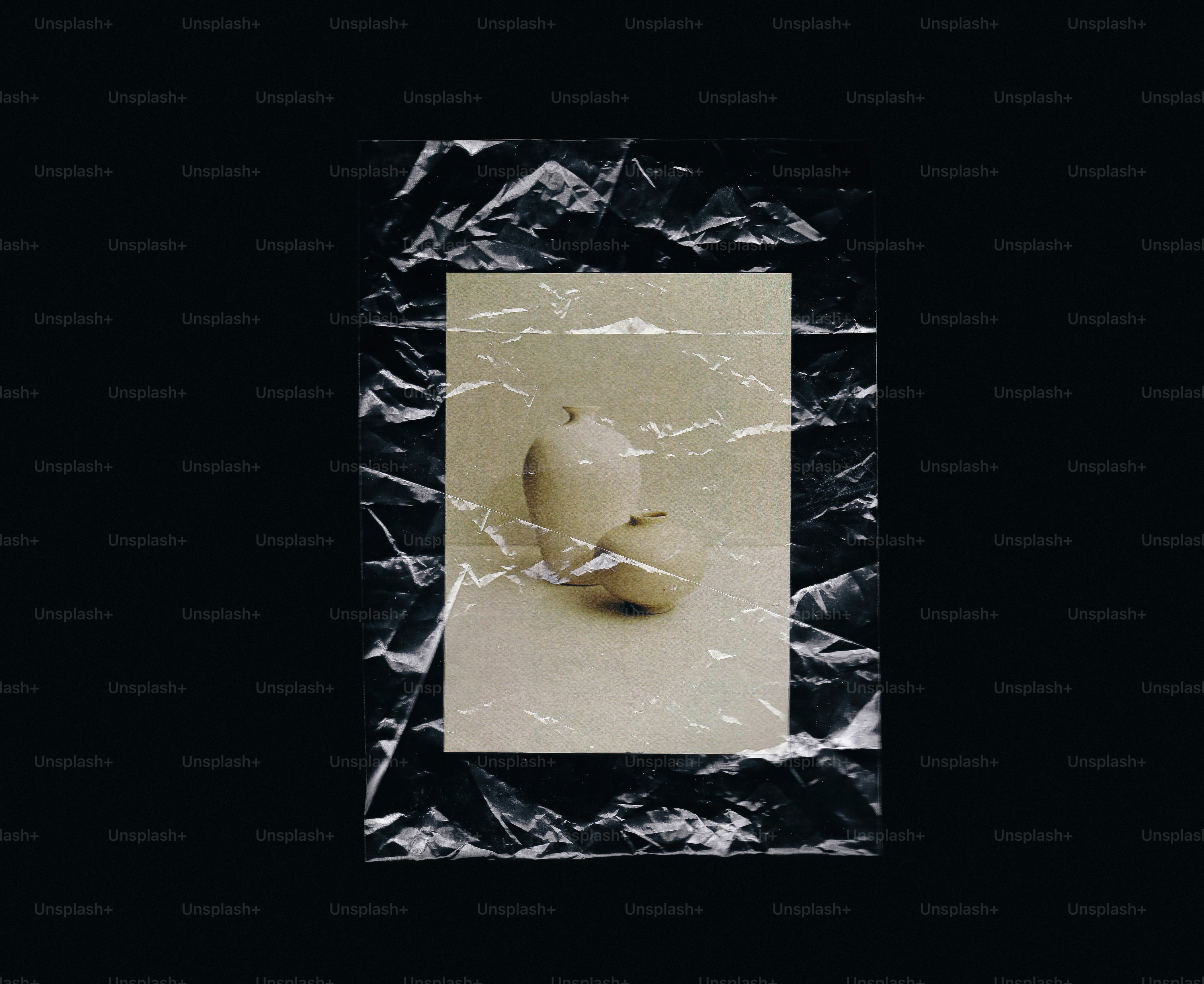 Two light-colored fruits on a light surface.