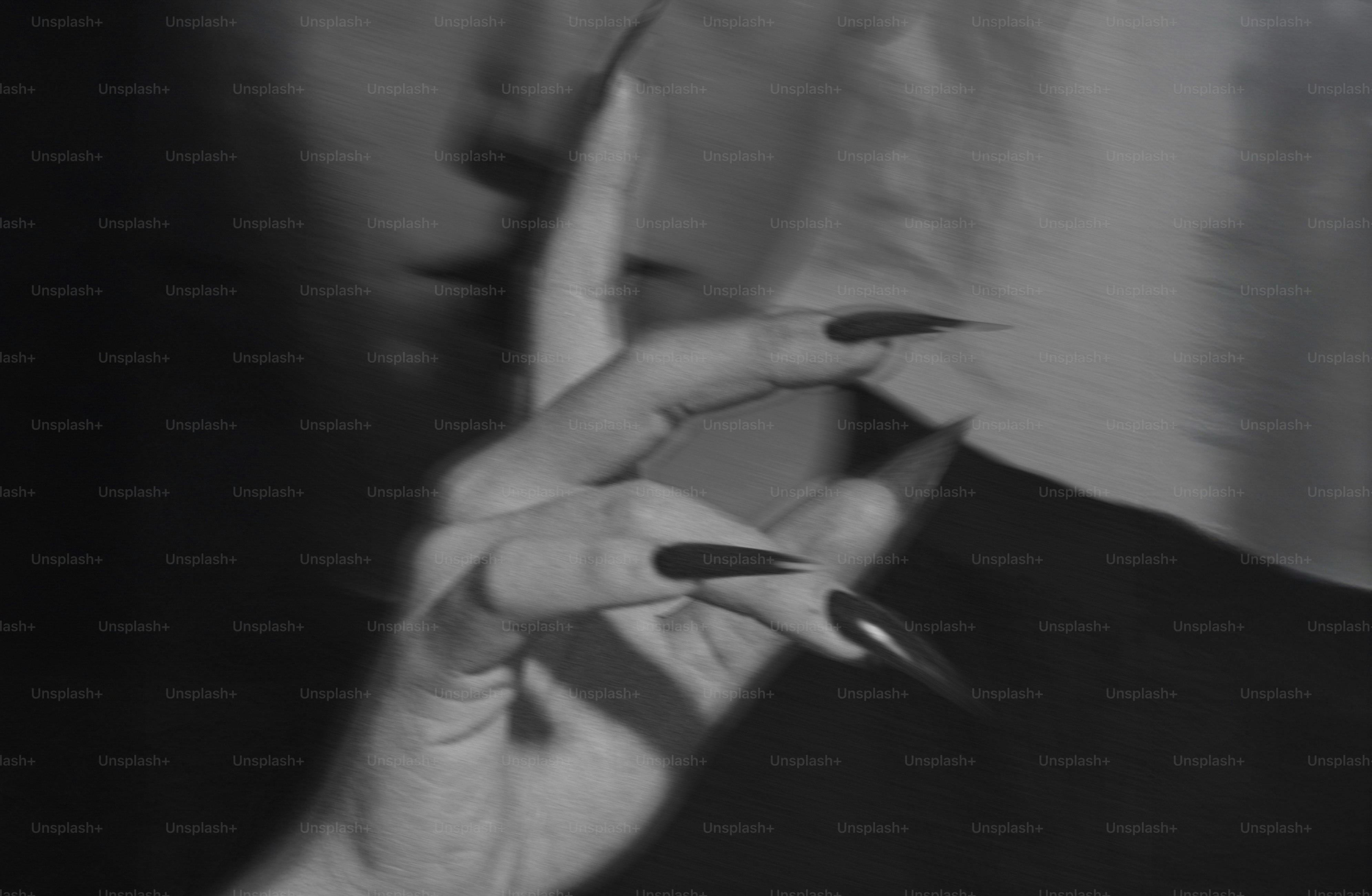 Woman with long sharp nails touches her face