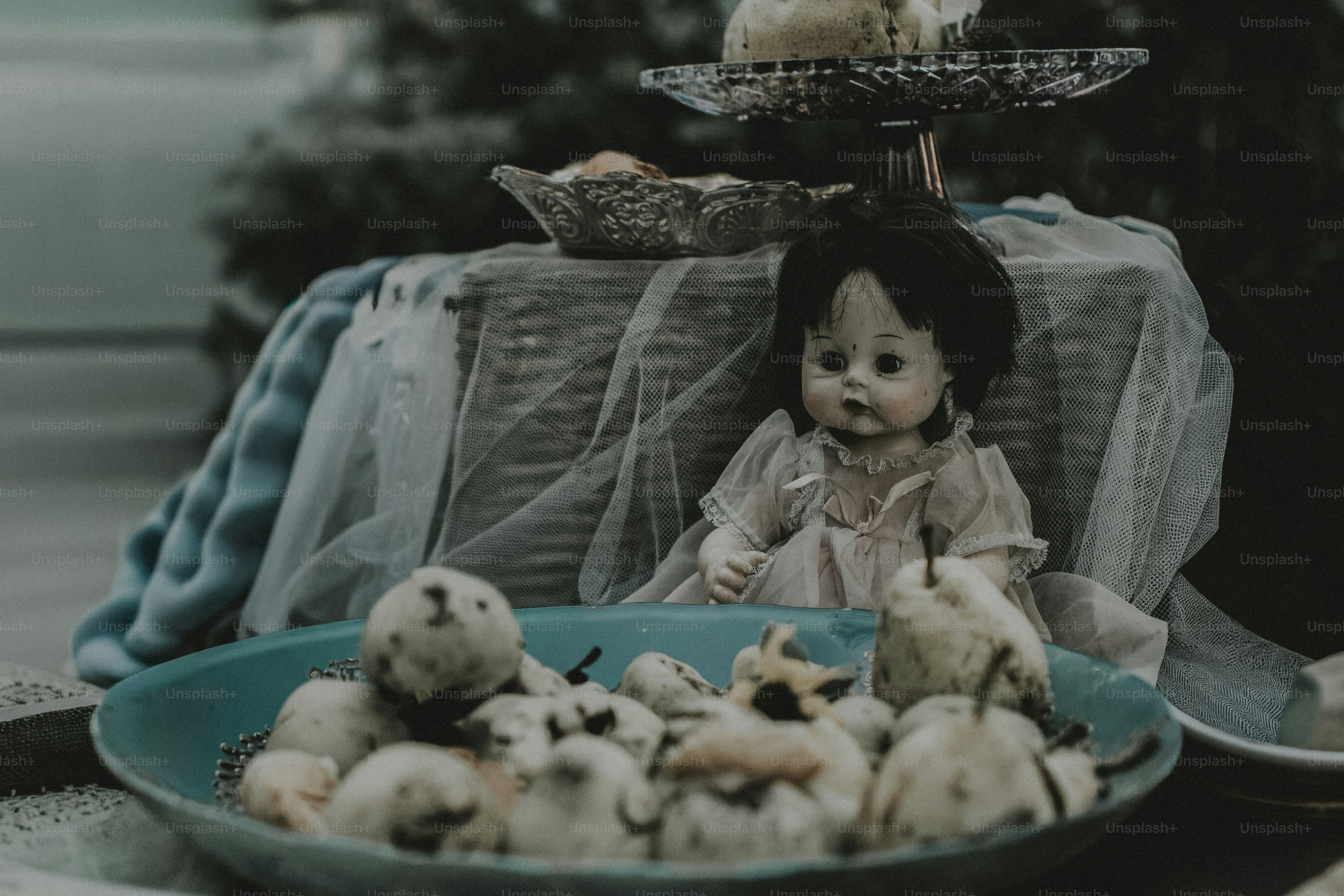 Vintage doll and pears on a table