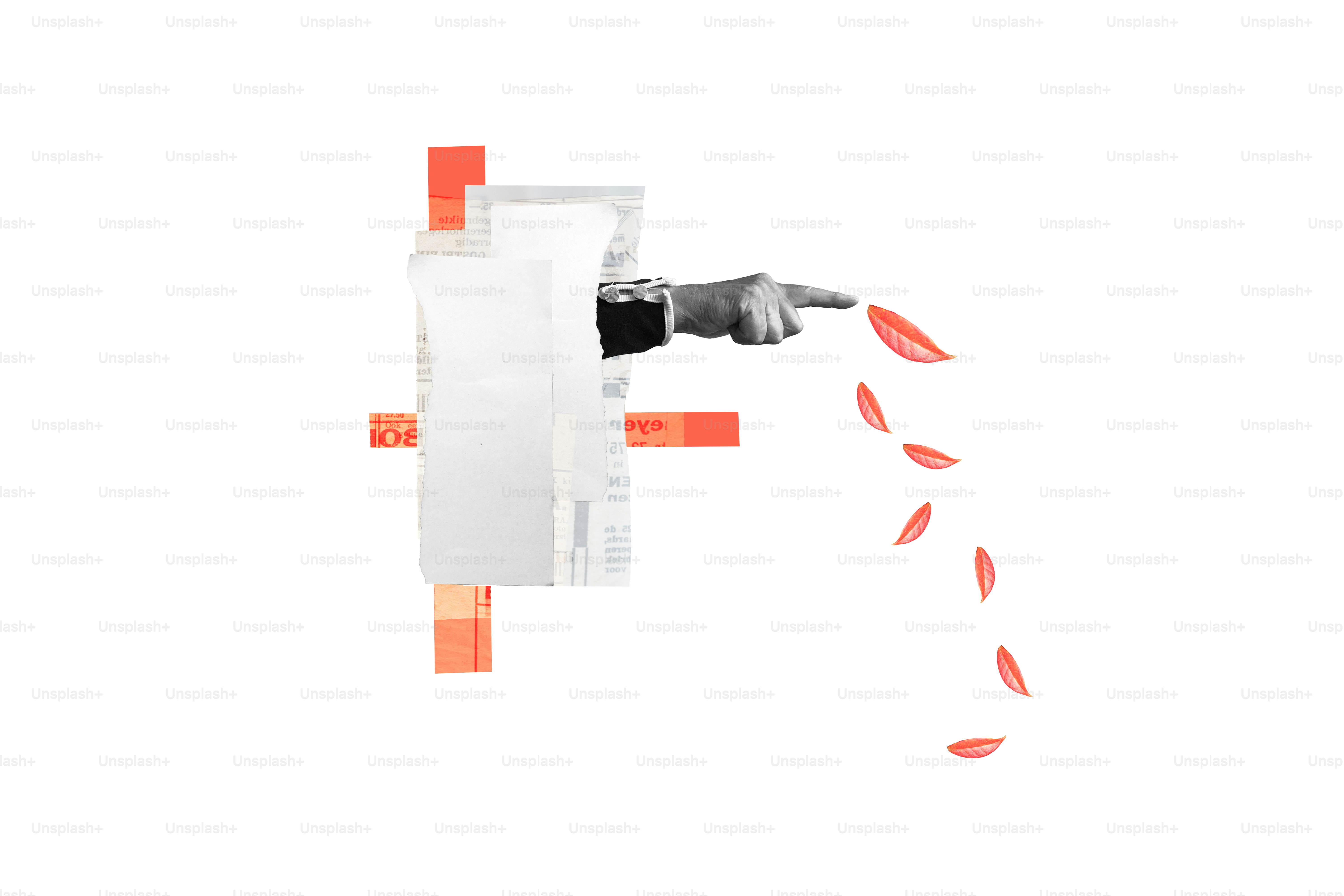 Hand pointing at falling red petals against white background
