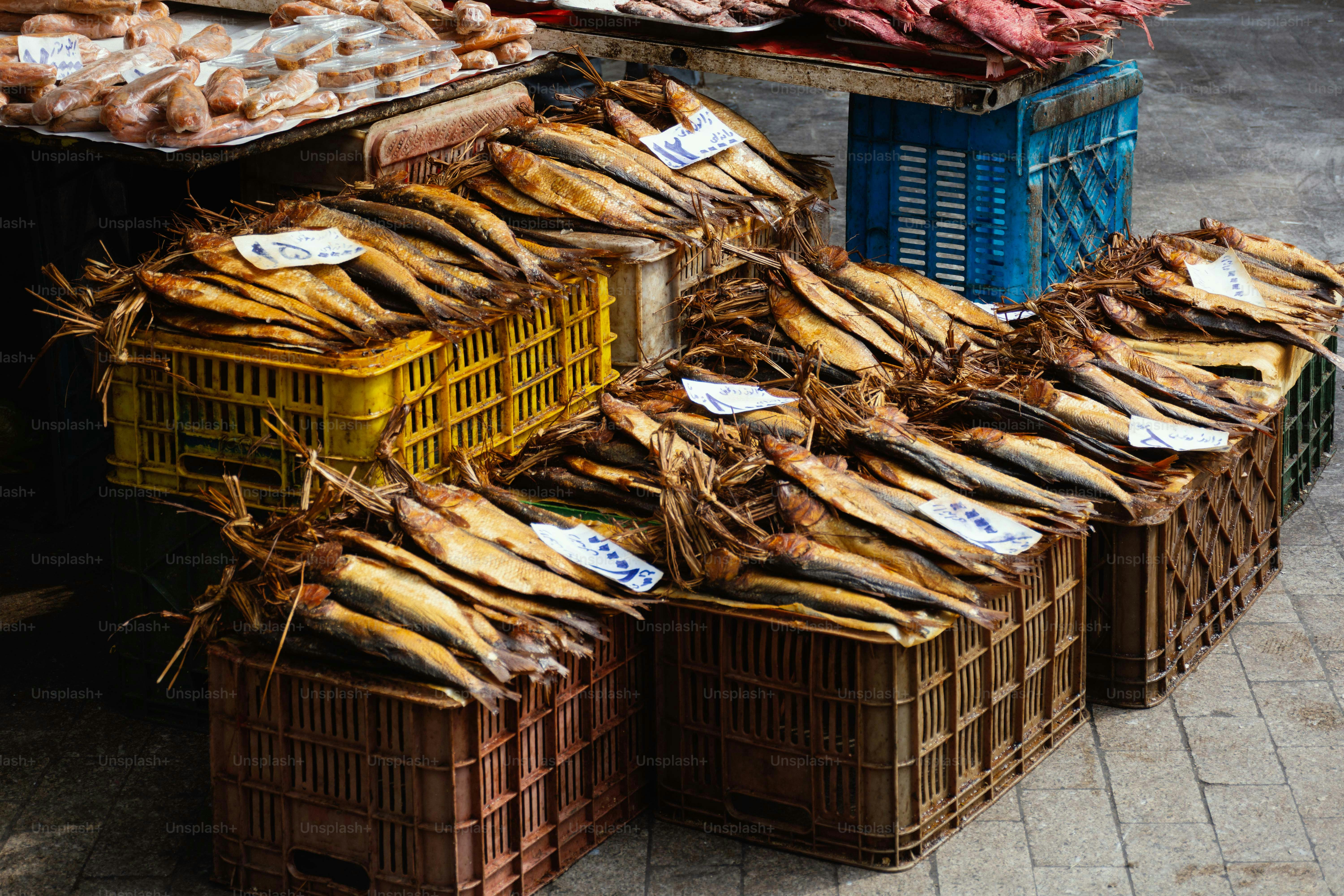 Crates of dried fish at a market stall