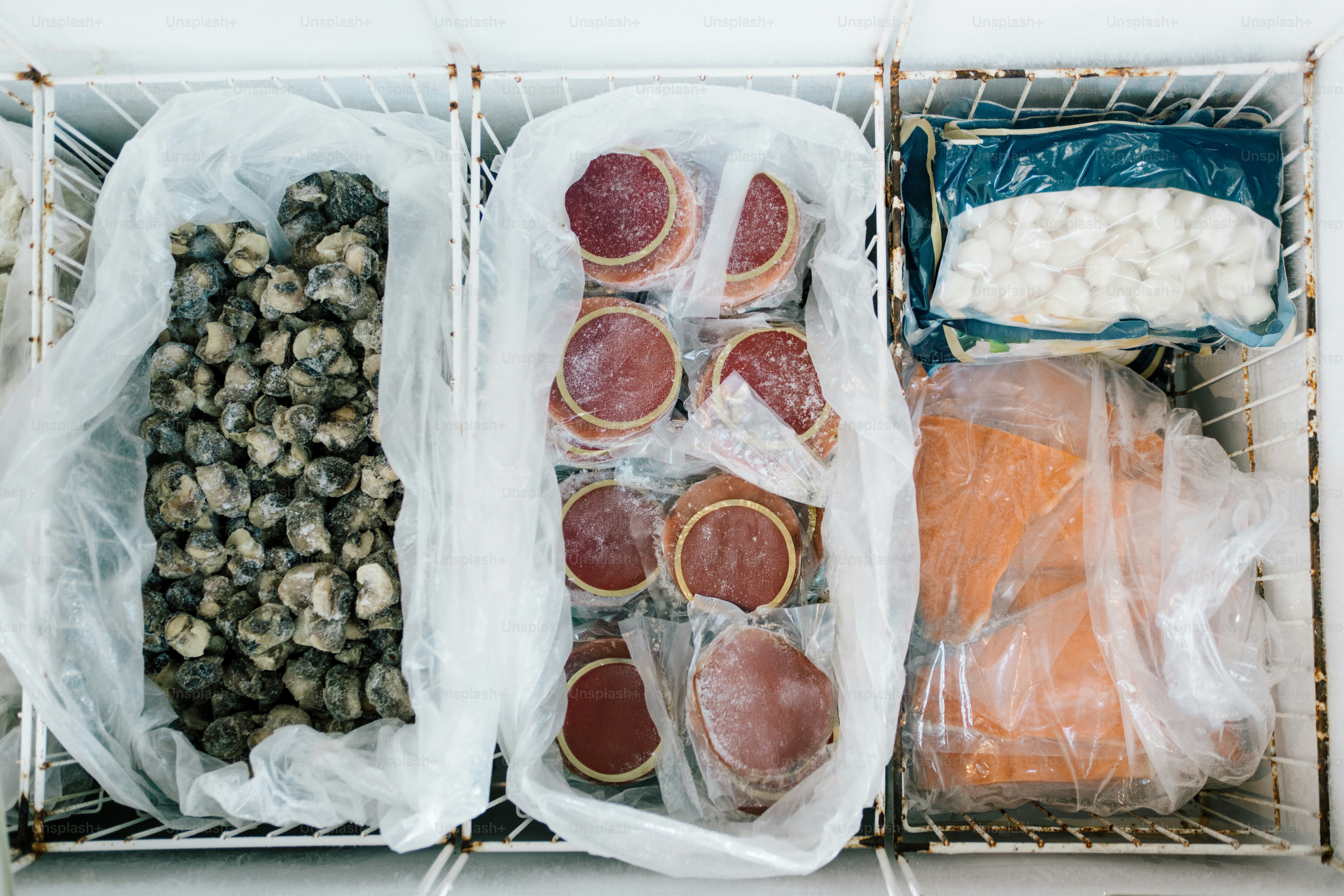 Frozen seafood and meat in a freezer