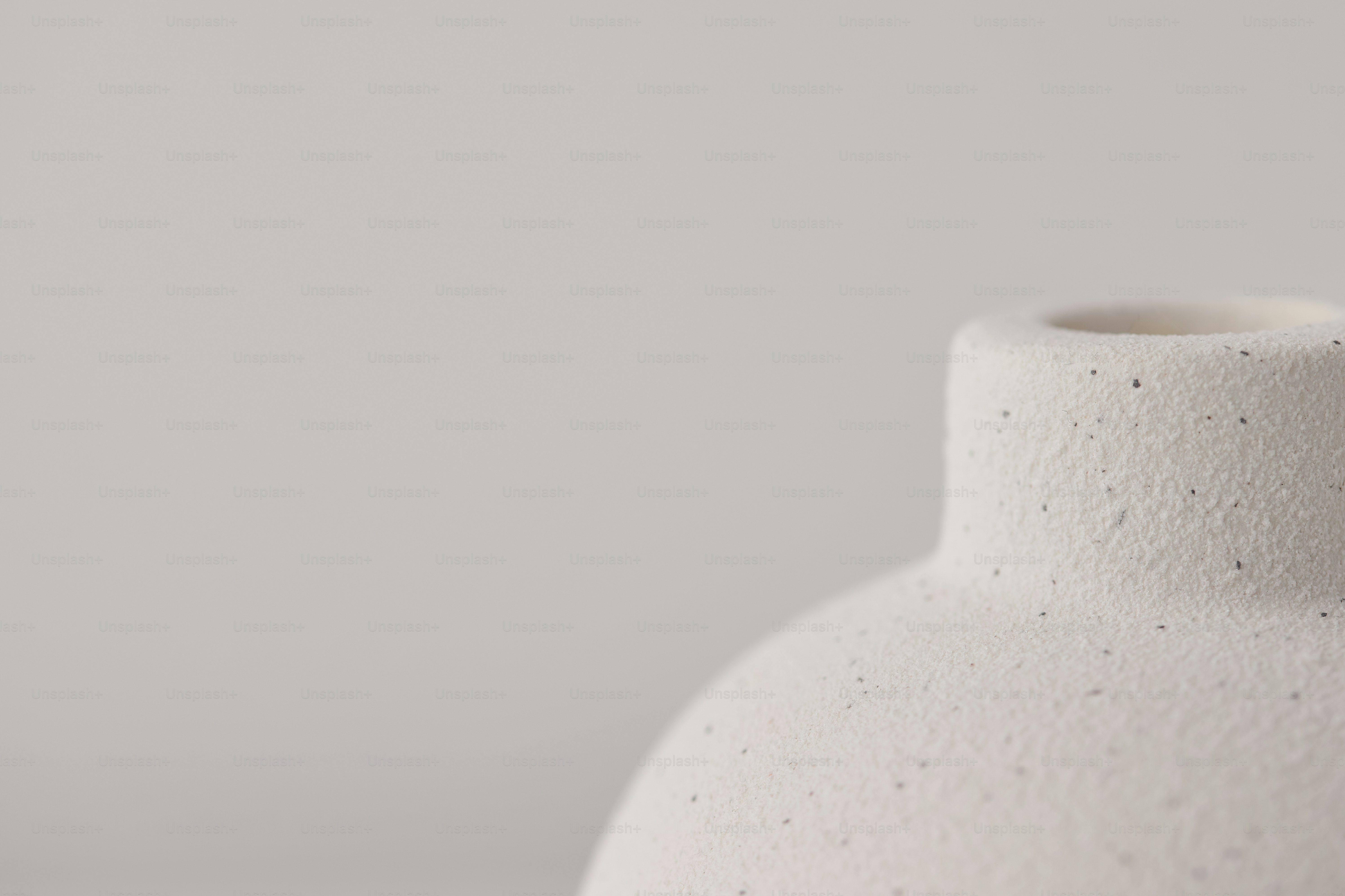 A textured white vase against a plain background photo – Interior Image ...