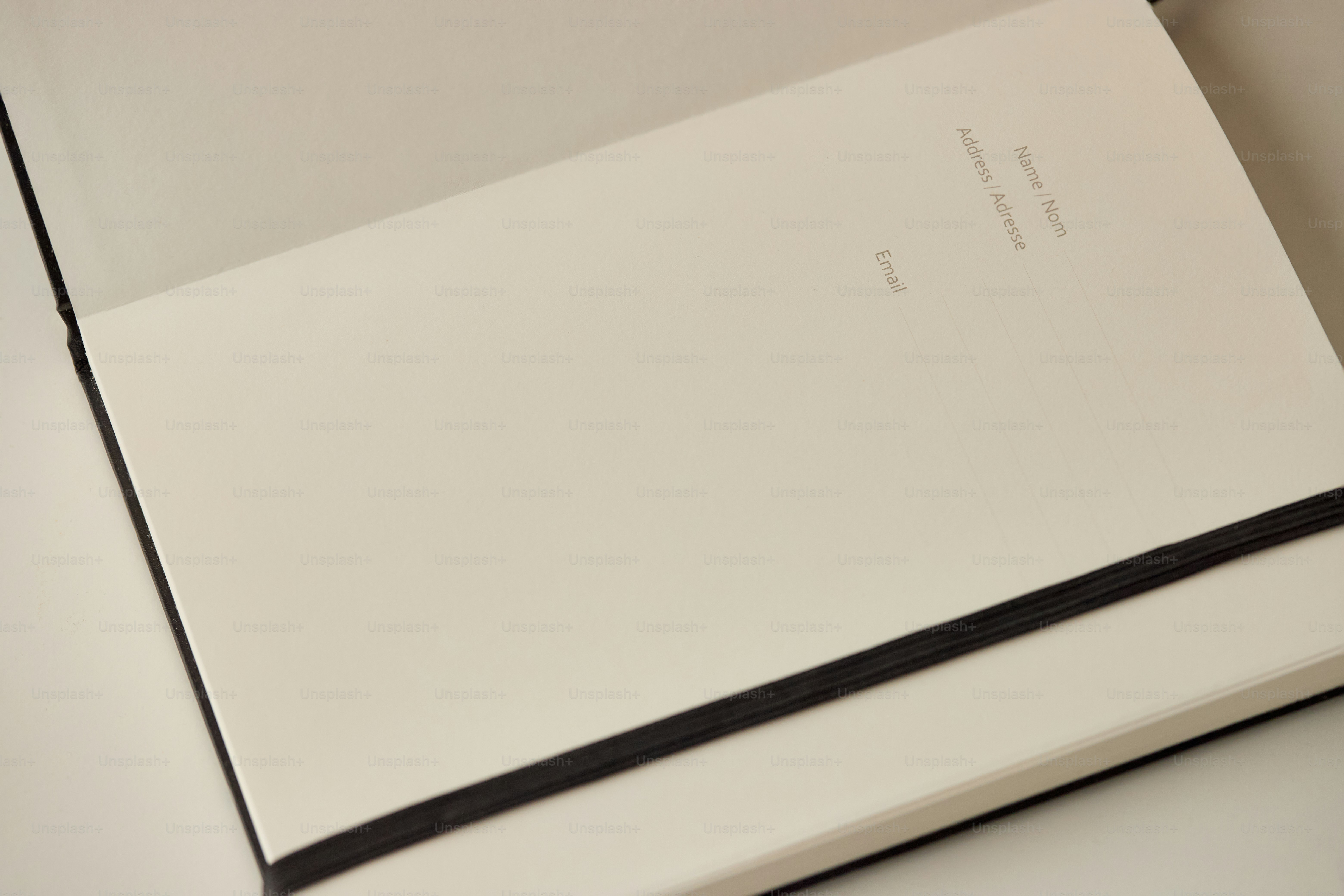 Simple open notebook with clean pages. Useful for stock imagery in planning, writing, creativity, productivity, and modern minimalist office or lifestyle visuals.