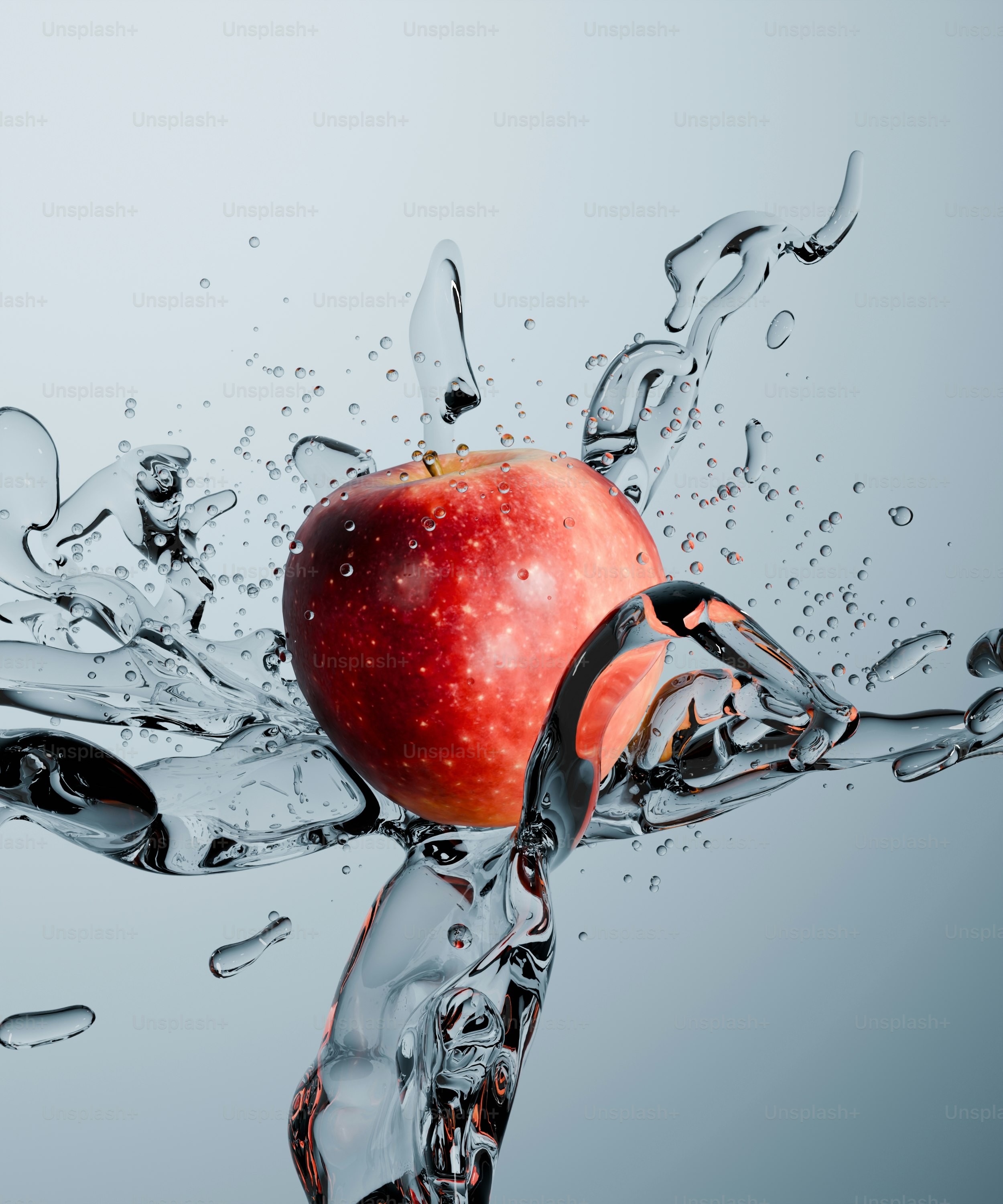 Ein roter Apfel, der durch klares Wasser spritzt.