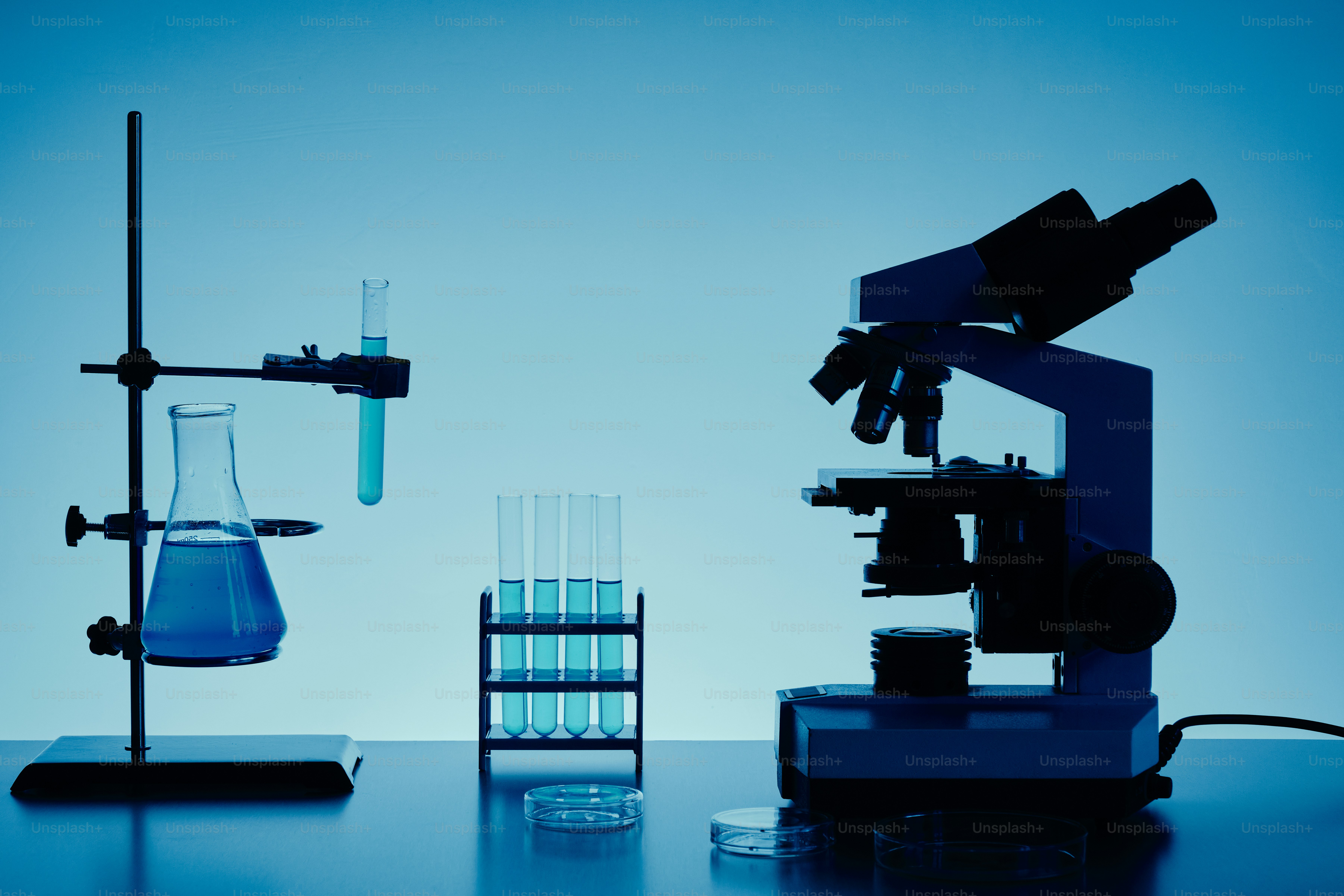 Laboratory equipment with microscope and test tubes