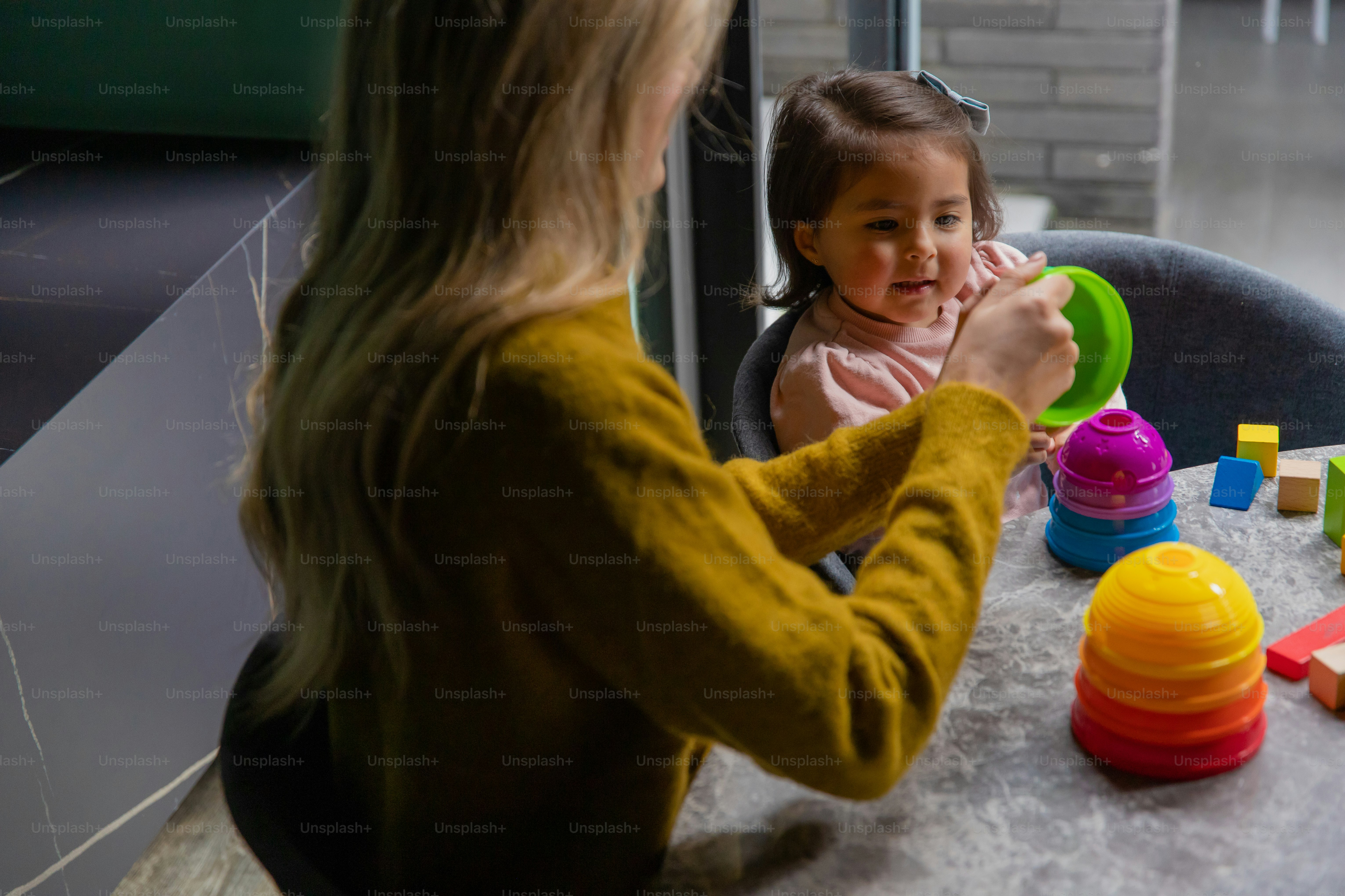 Children using hands-on learning materials to practice numbers and problem solving
