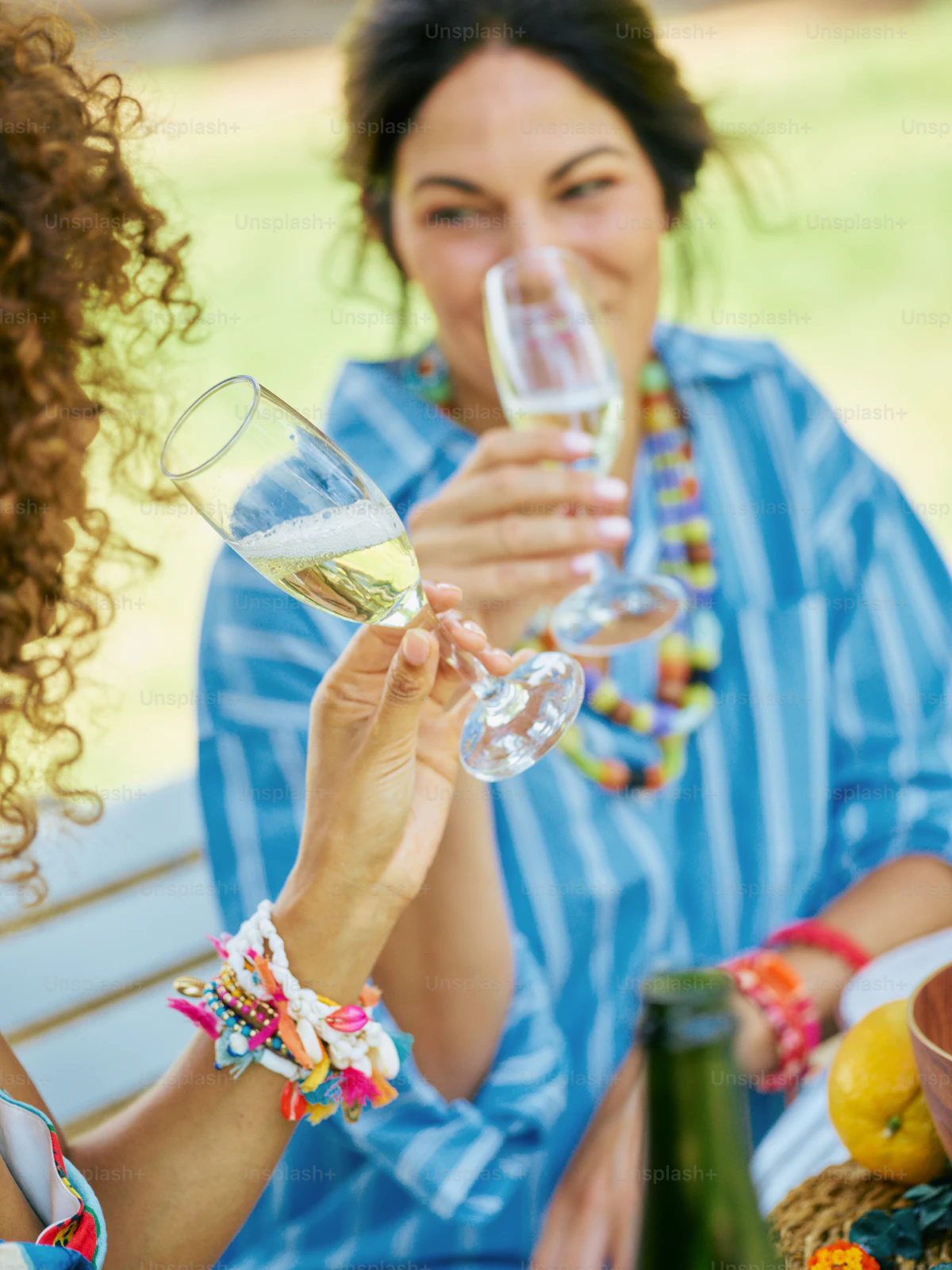 Elegant outdoor toast with sparkling wine in natural light