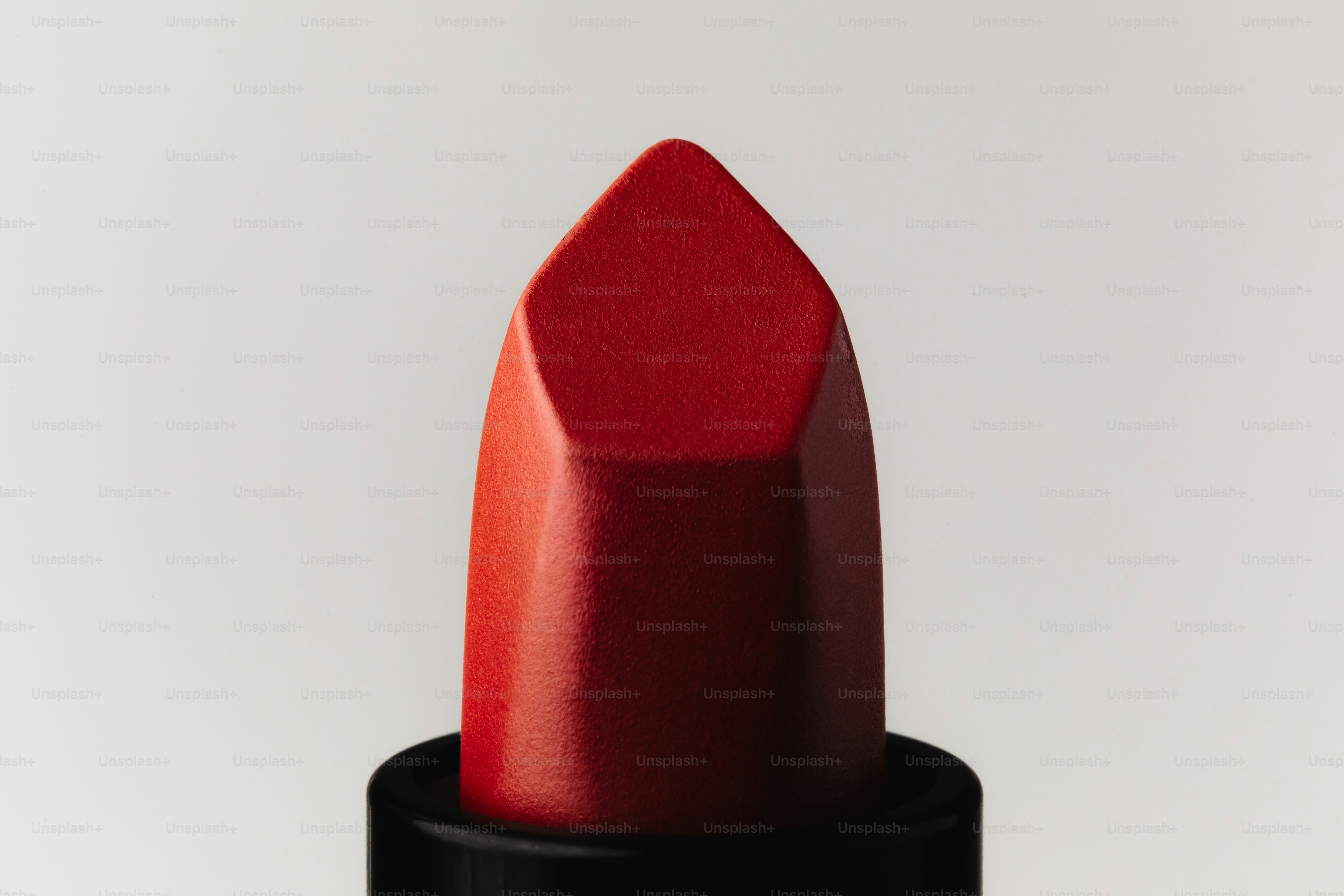 Close-up of a red lipstick bullet