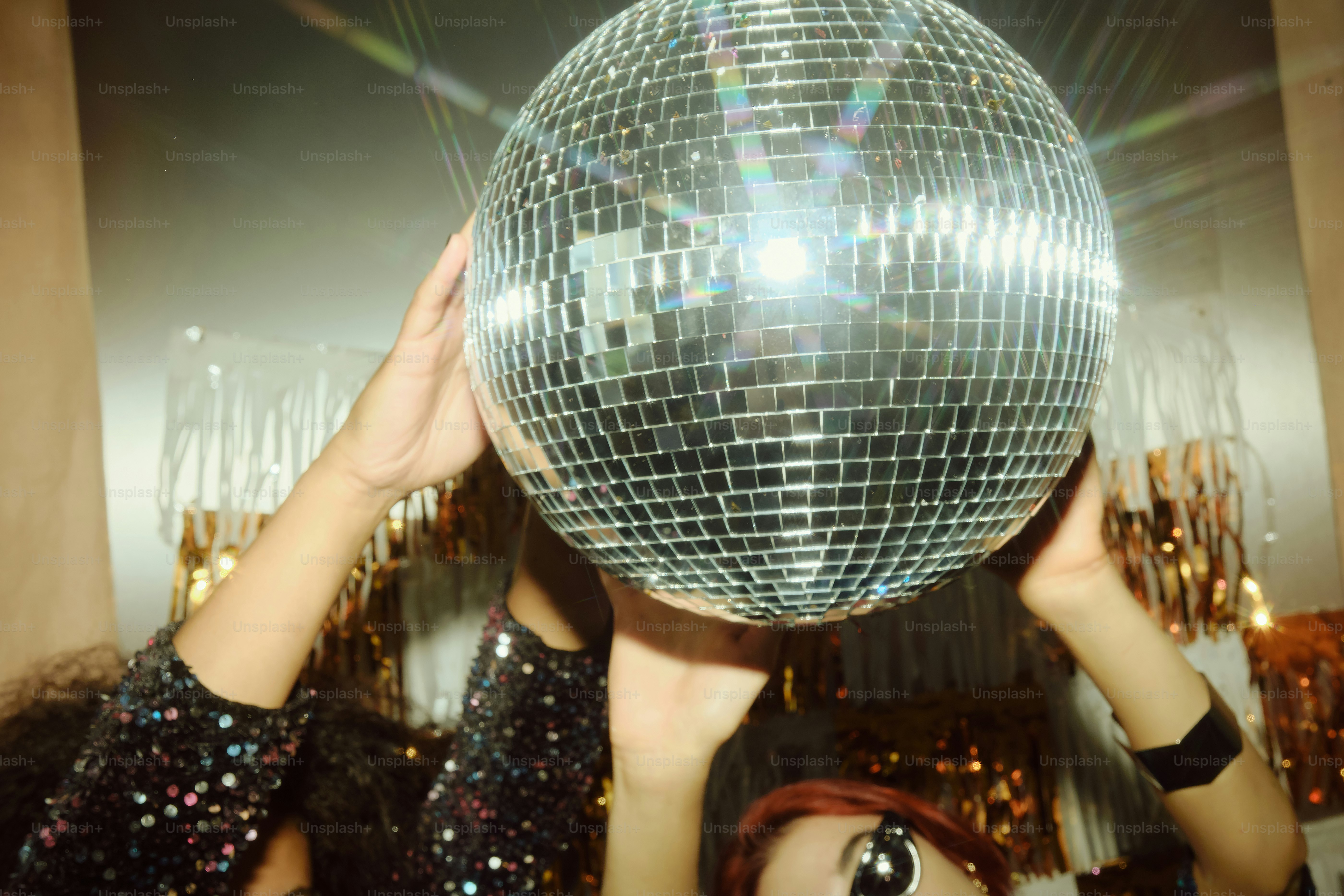 Partygoer wearing Beatnix Costume Shop curly wigs inspired by authentic 1970s disco fashion