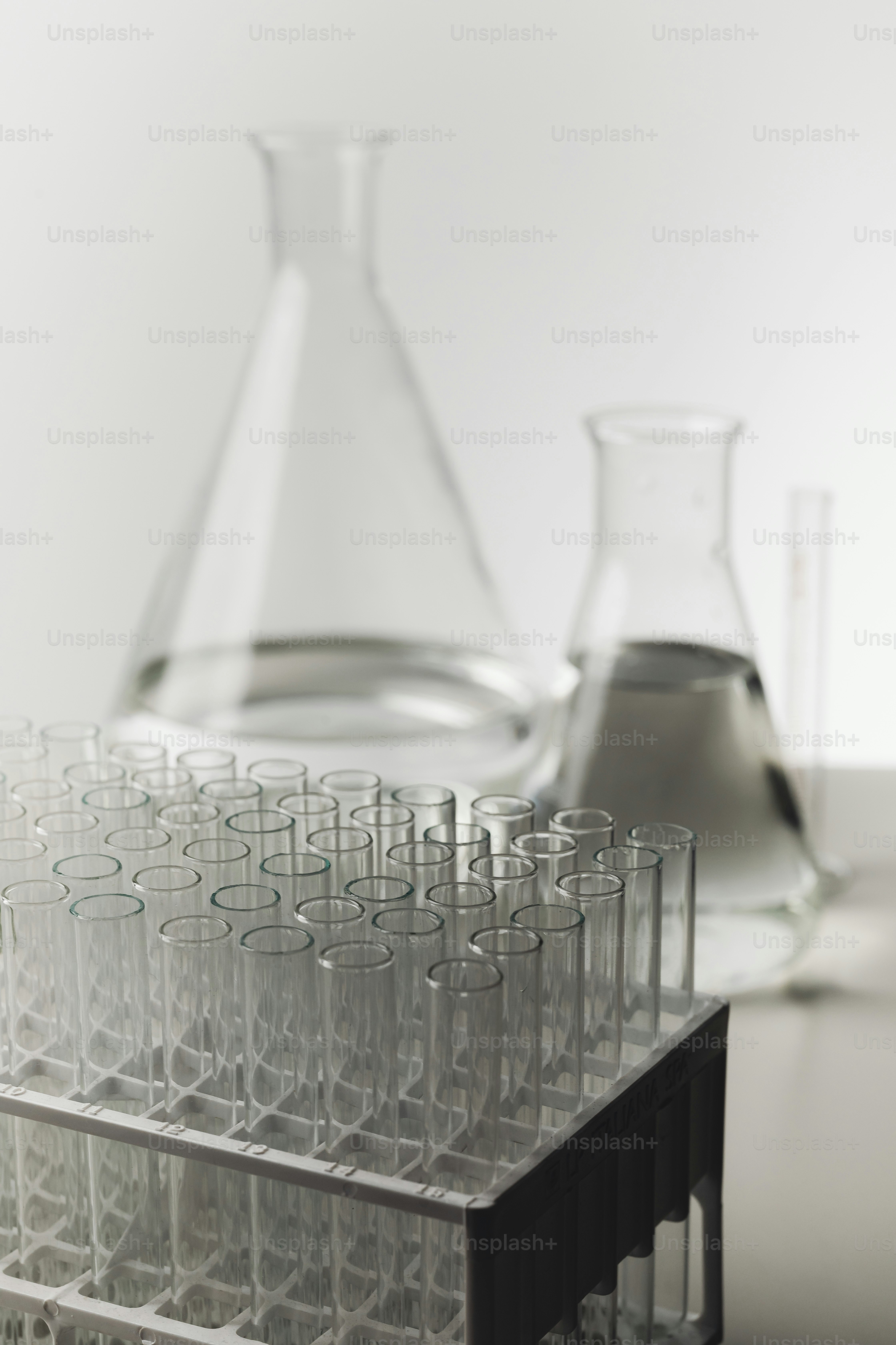 Laboratory glassware with test tubes and flasks. photo – Education ...