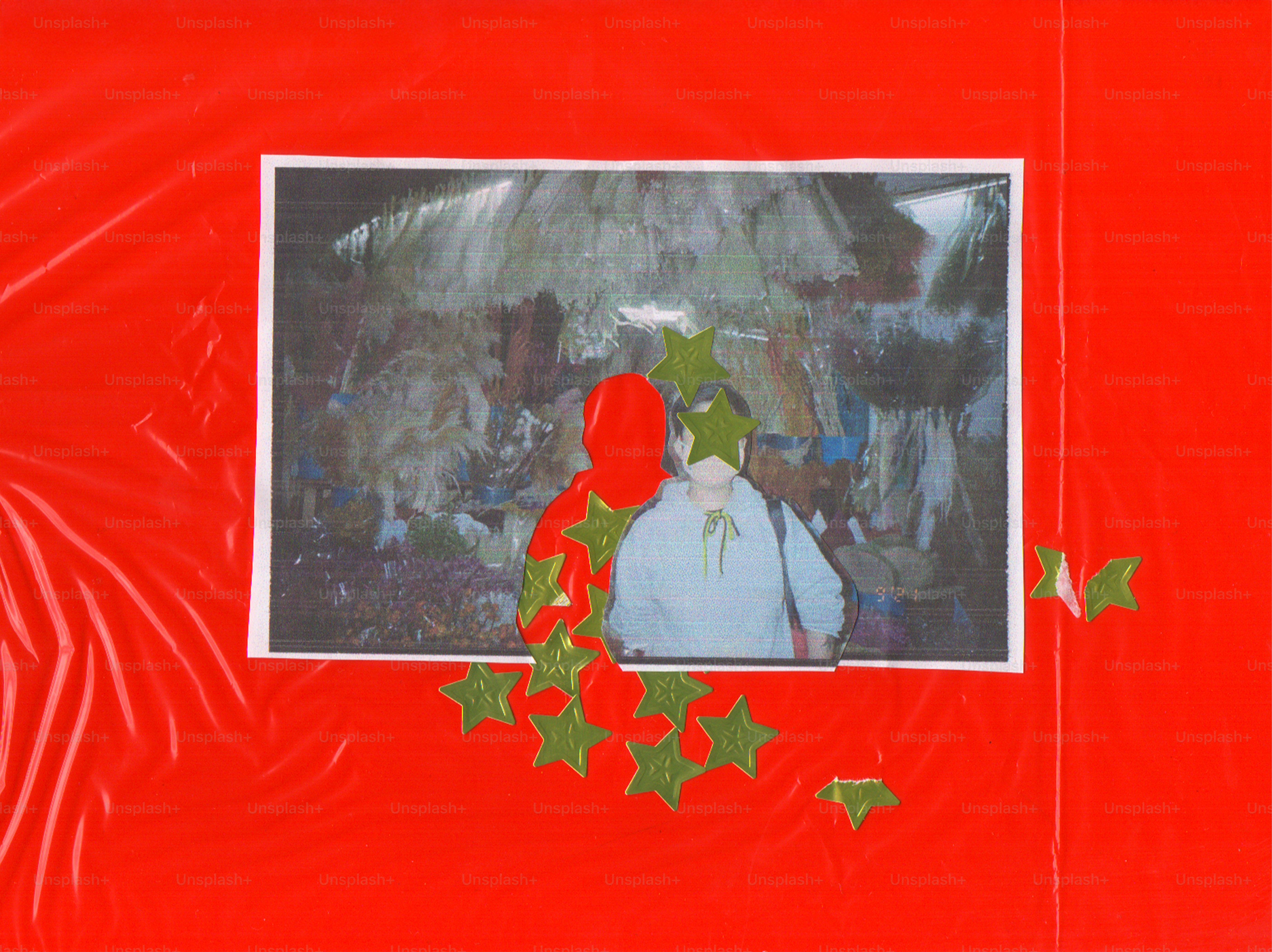 Two figures with green stars on red background