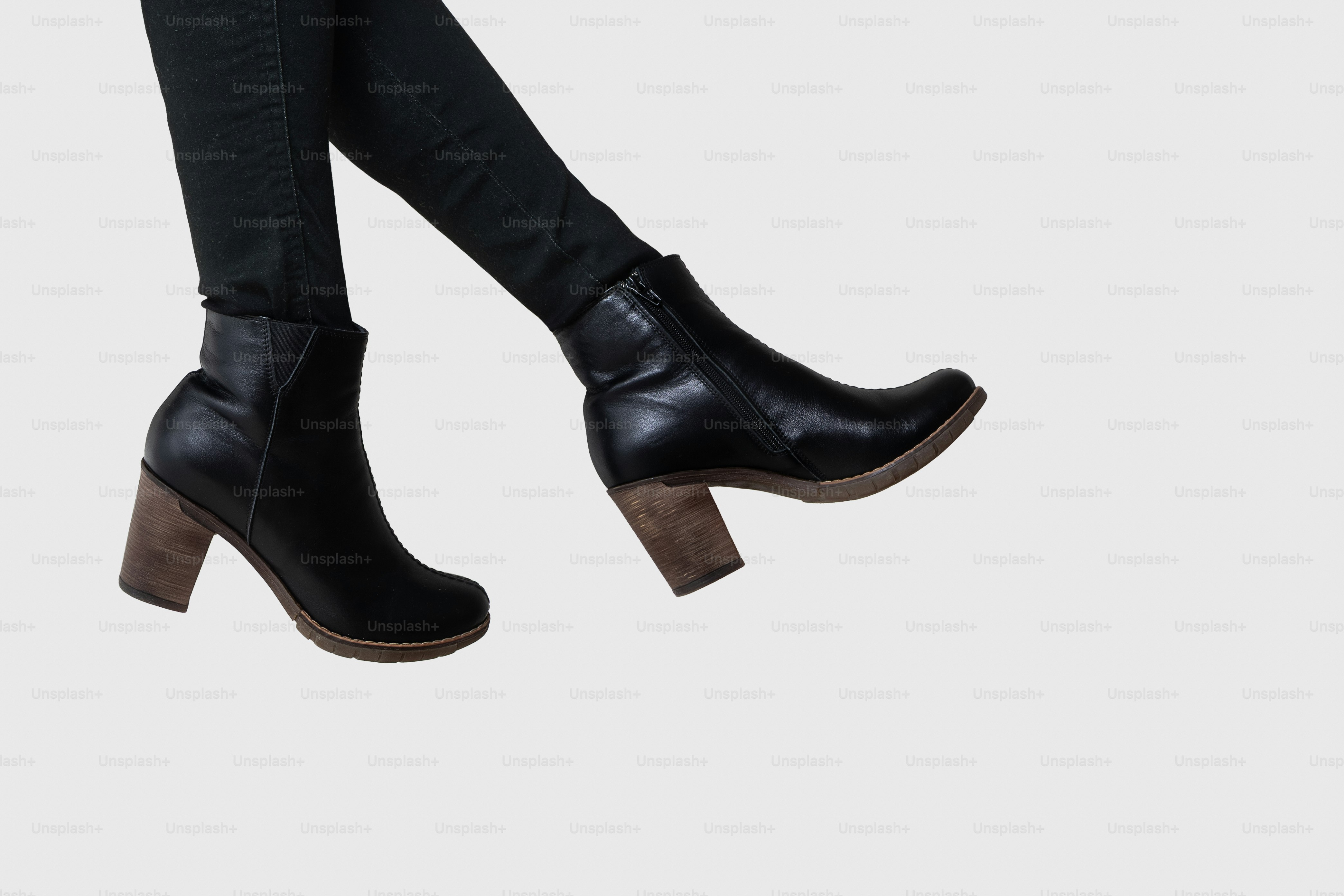 Black leather ankle boots with wooden heels.