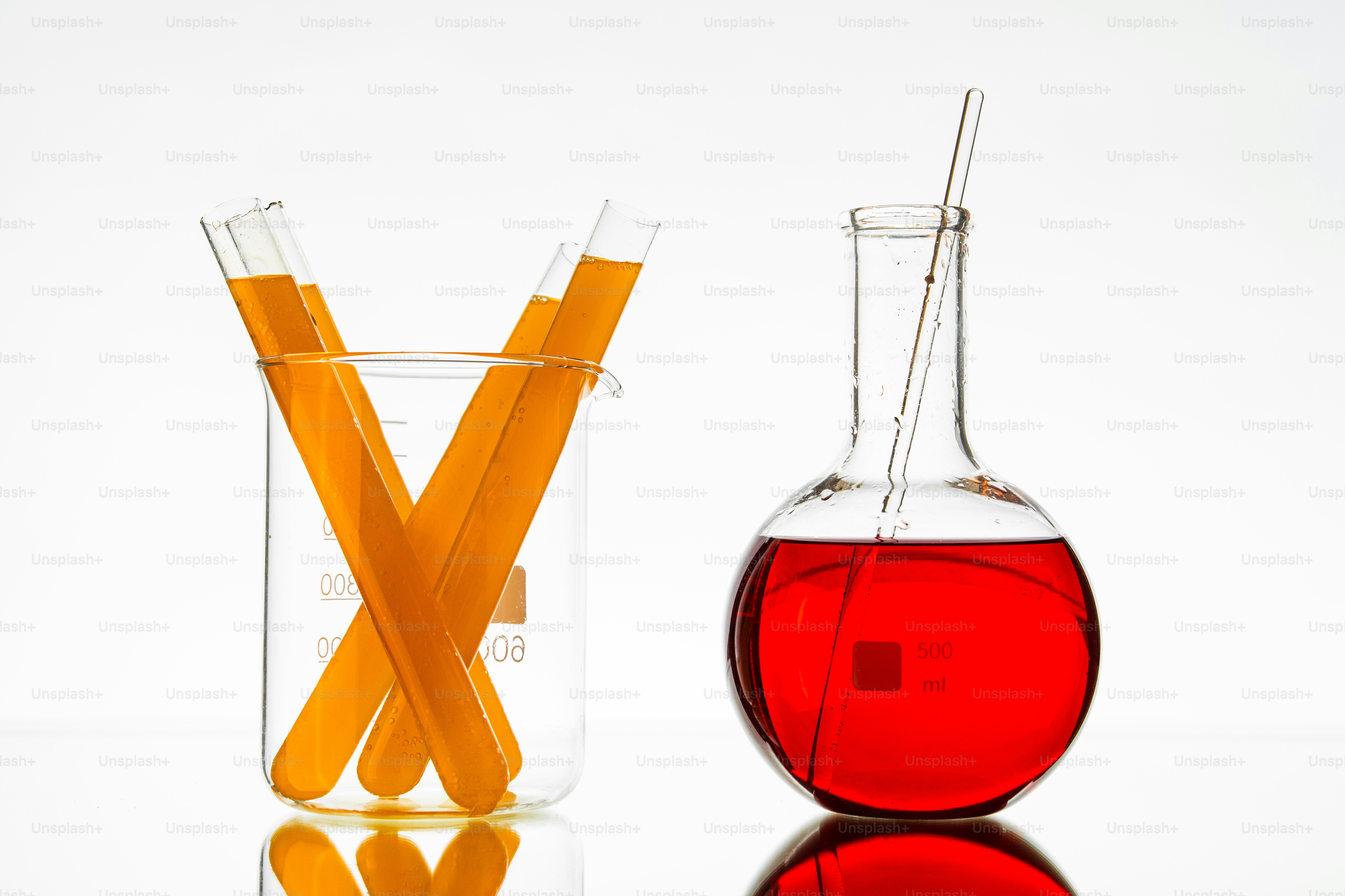 Test tubes and flask with colored liquids
