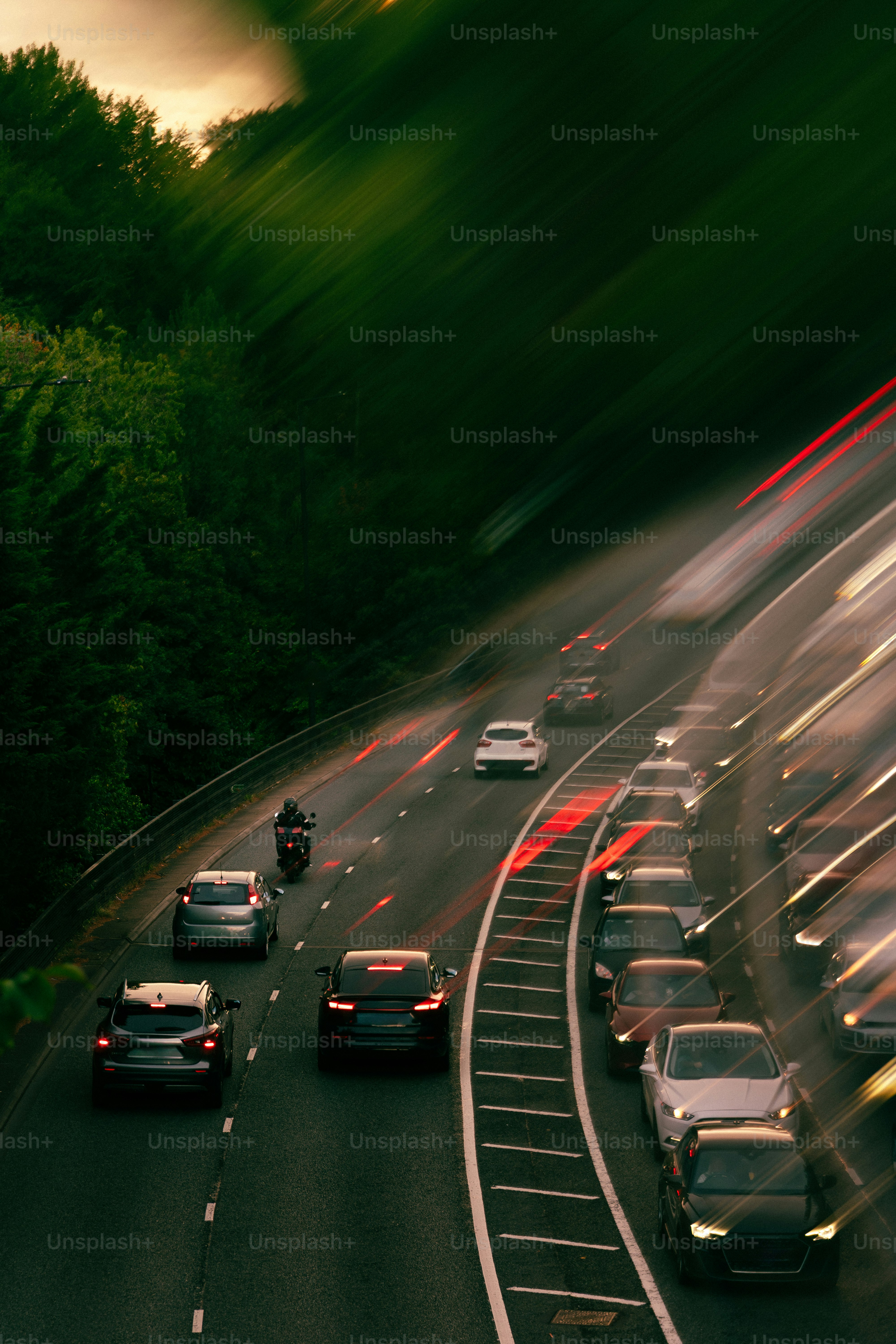 Traffic congestion on a highway at dusk.