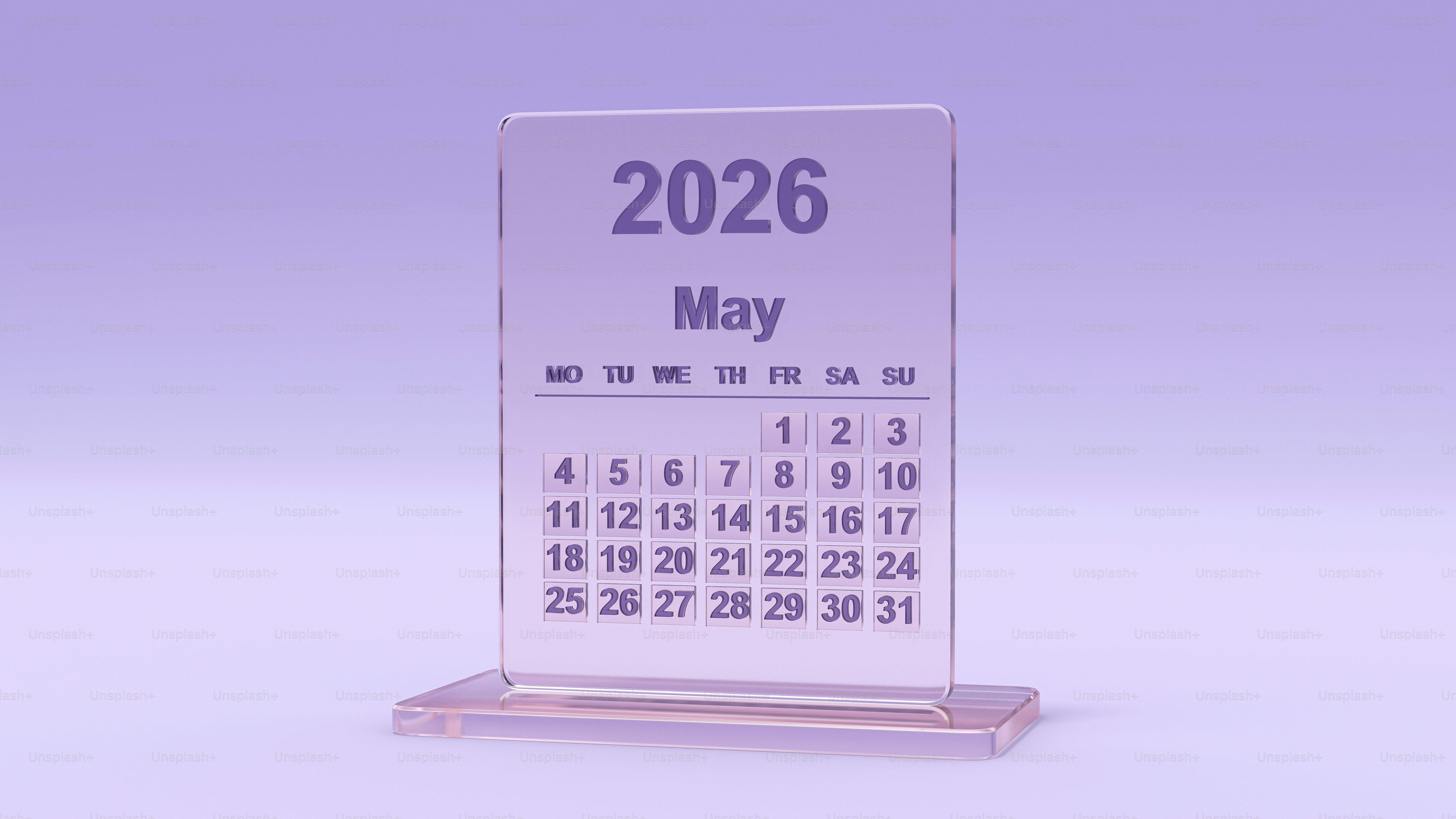 Un calendario chiaro che mostra il maggio 2026 su uno stand.