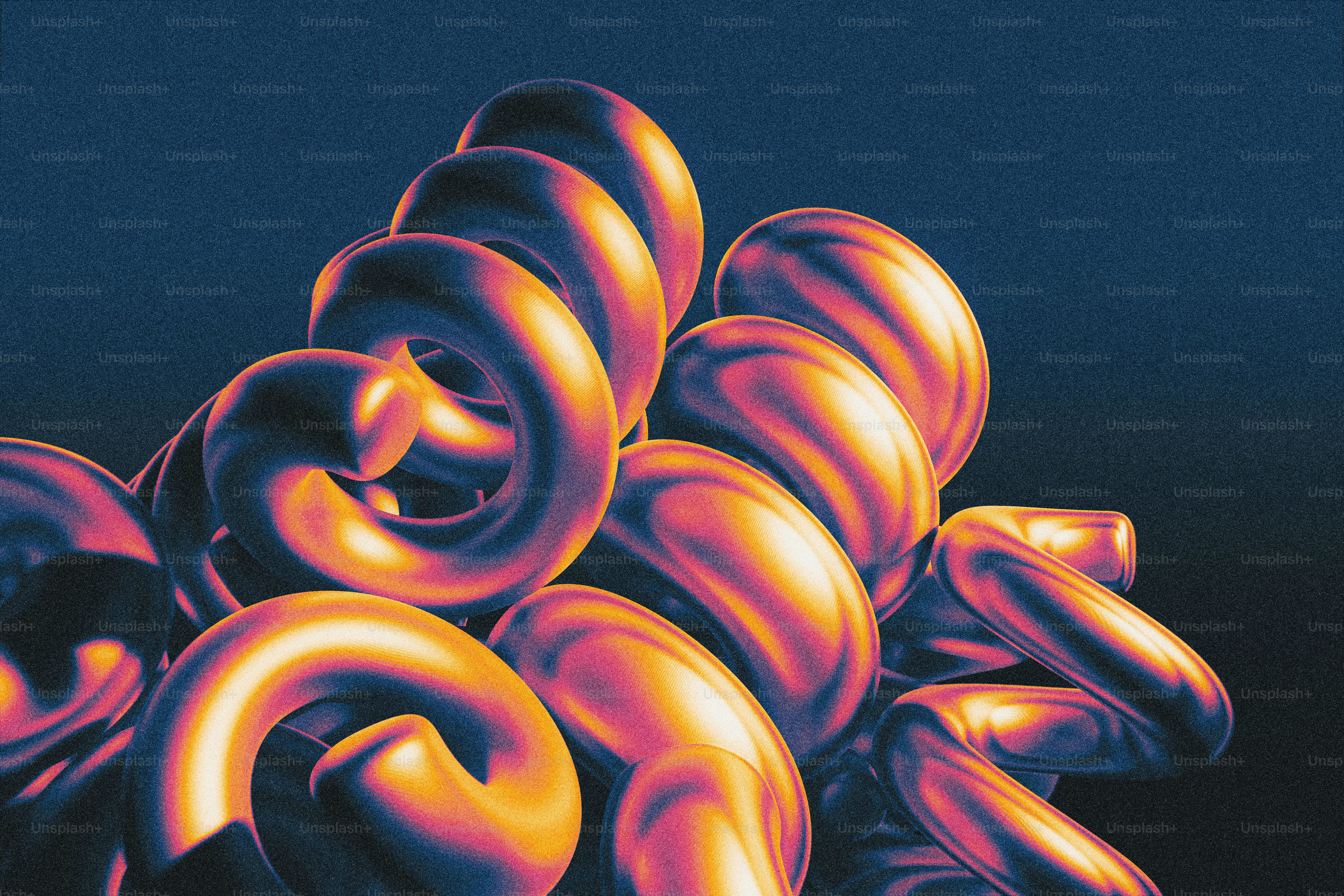 Abstract metallic coils with warm lighting against dark background ...