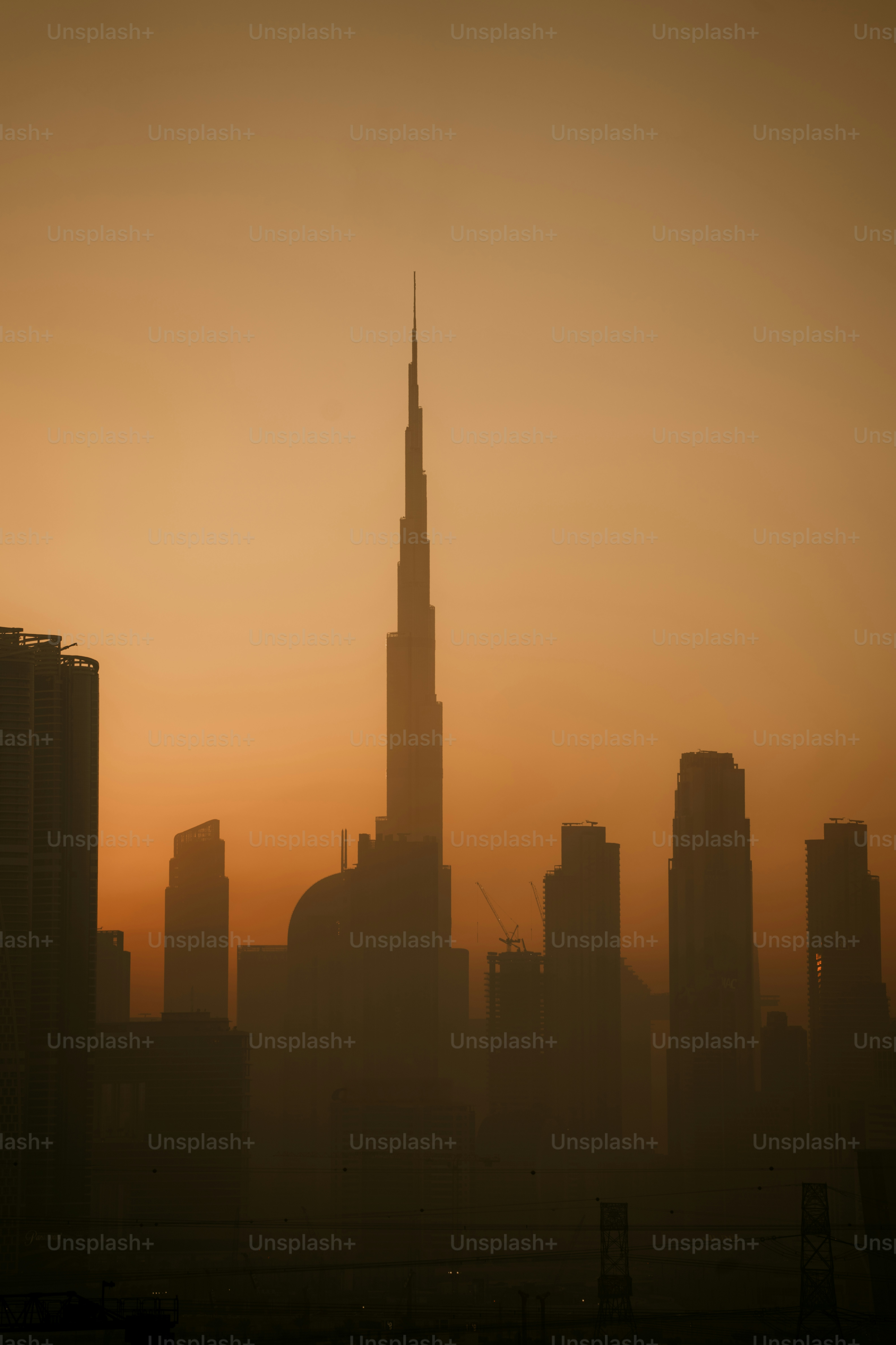 Silhouette of dubai skyline at sunset