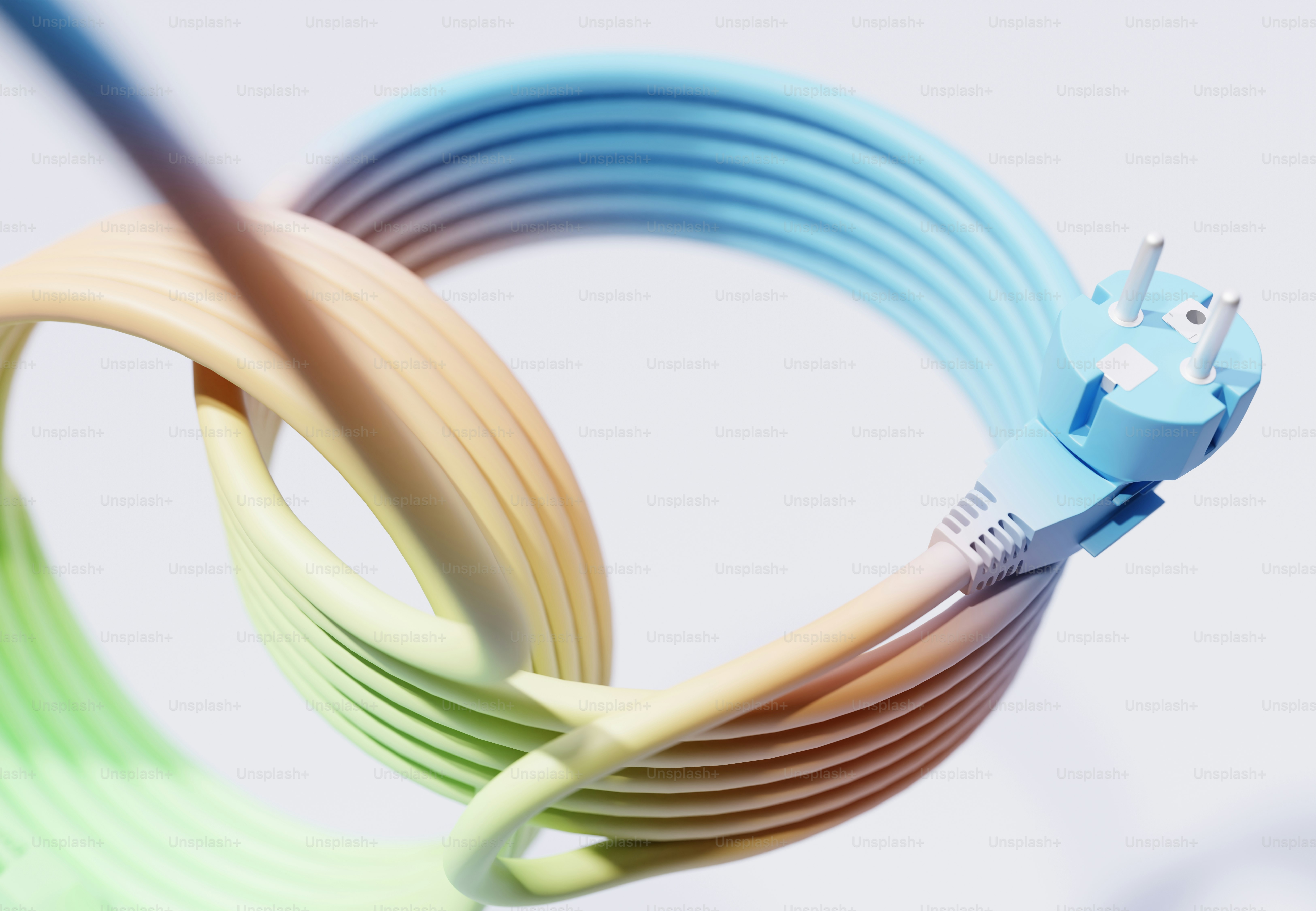 A colorful coiled electrical cord with a plug