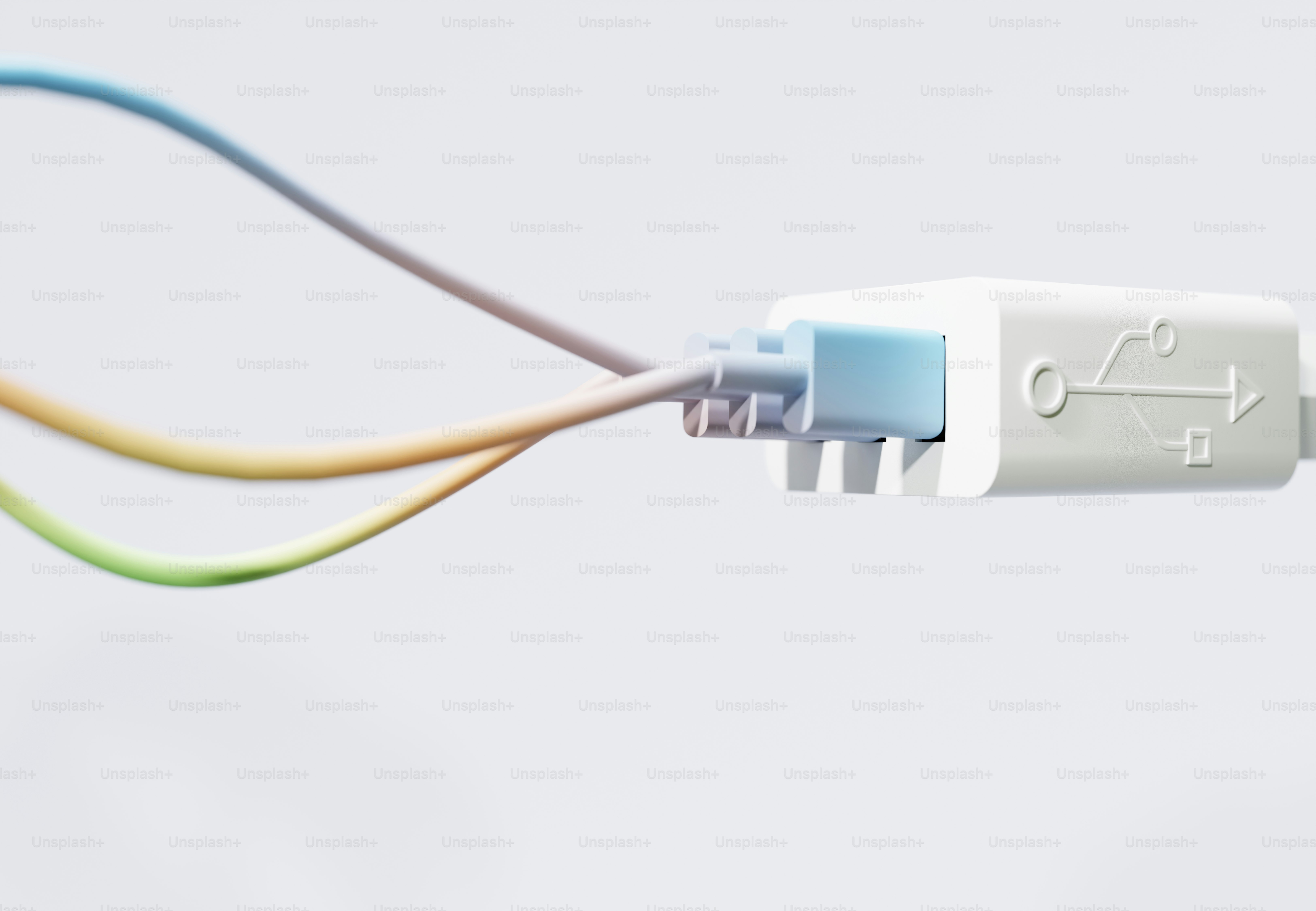 Nahaufnahme eines weißen USB-Steckers mit bunten Drähten