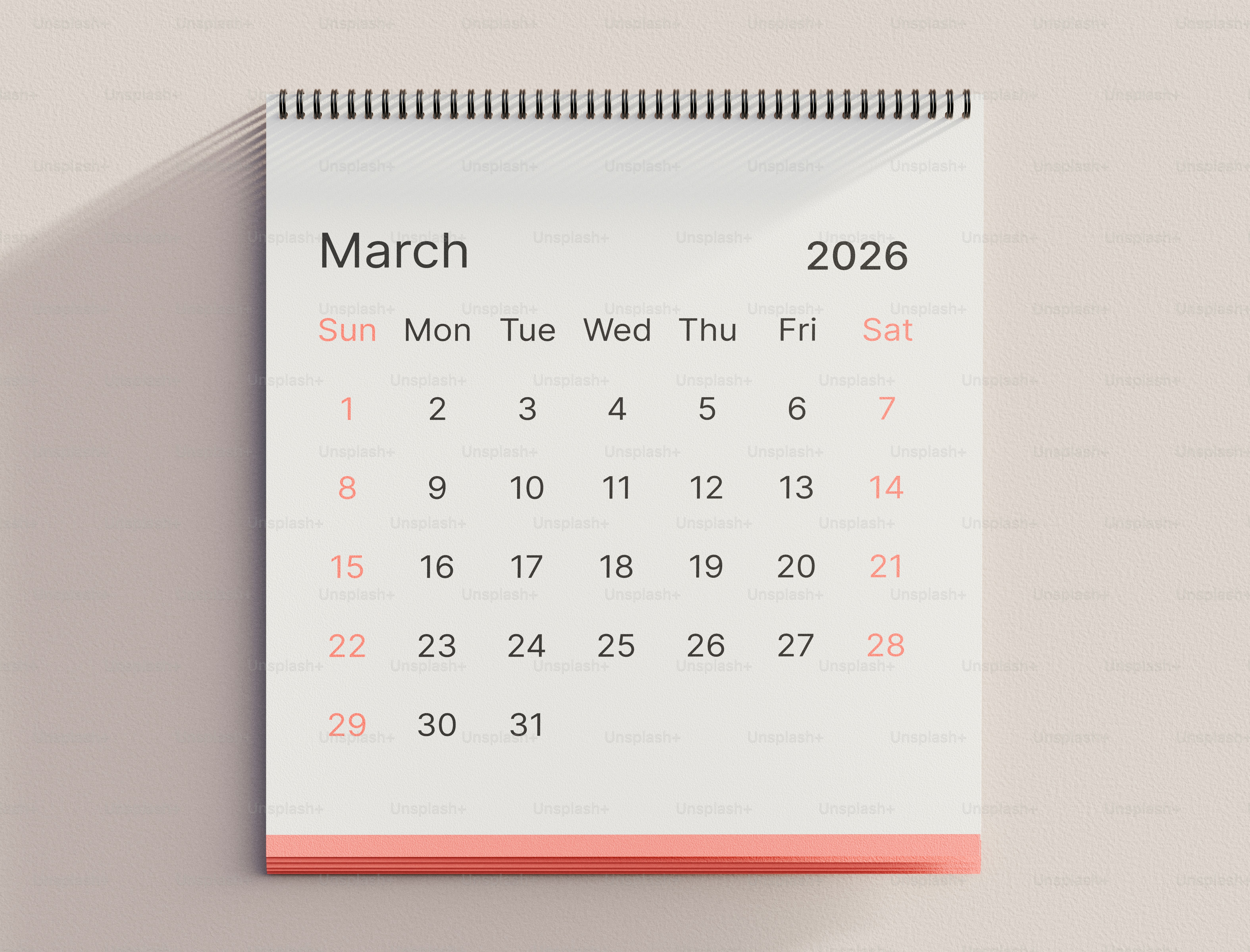 March 2026 calendar page casting a shadow