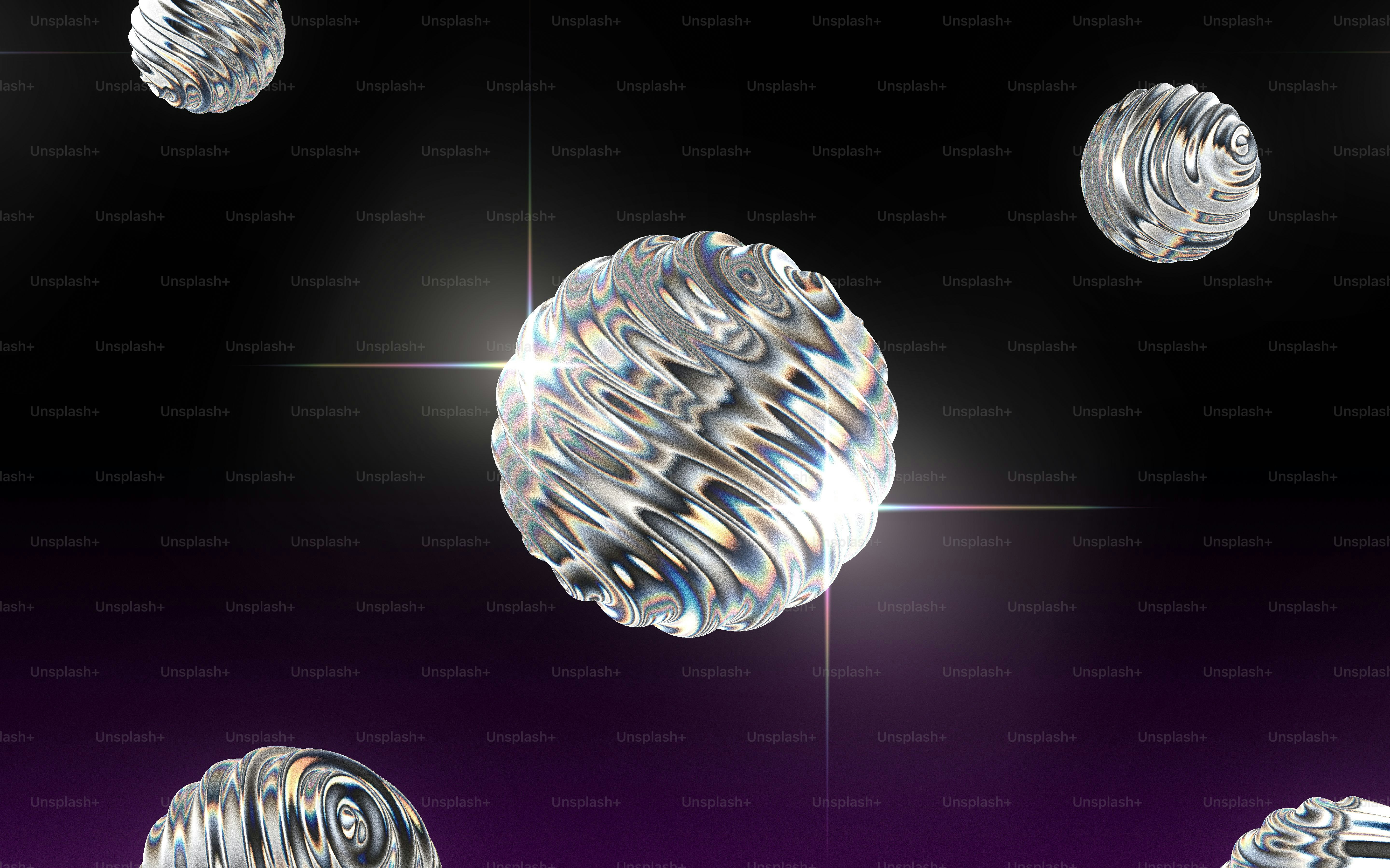 Abstract spheres with reflective surfaces float in darkness. photo ...