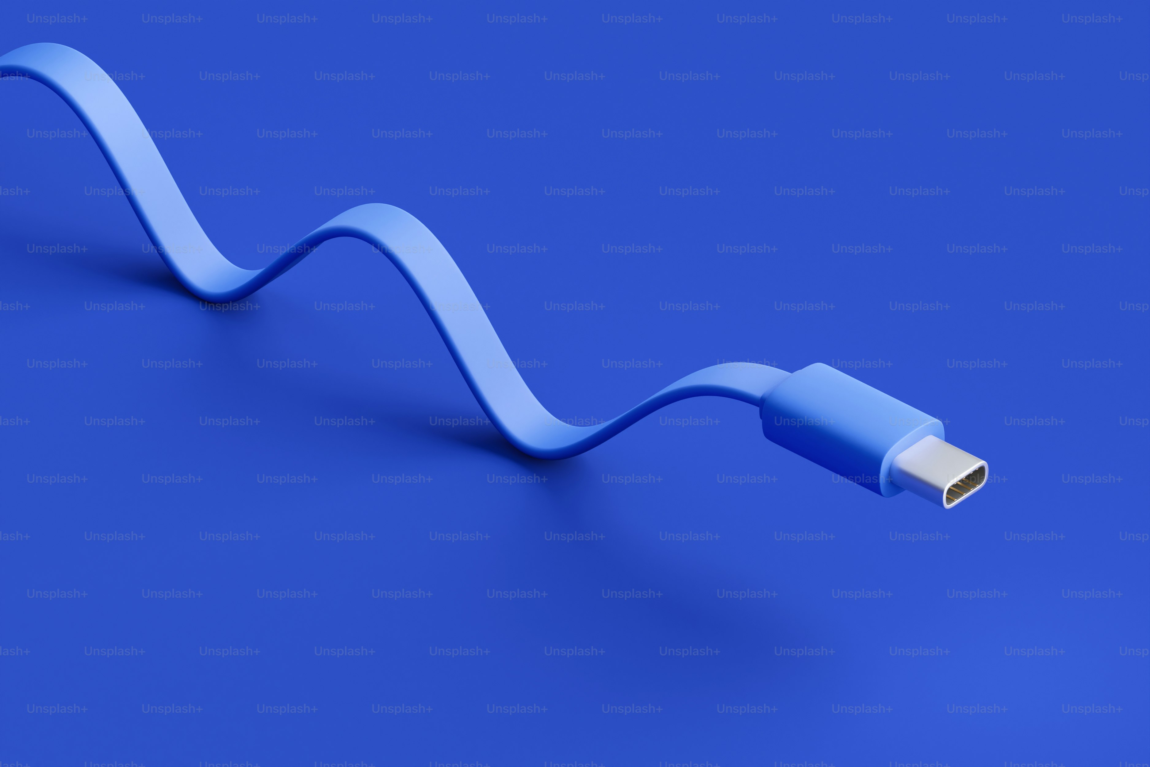 Kabel usb-c biru dengan latar belakang biru